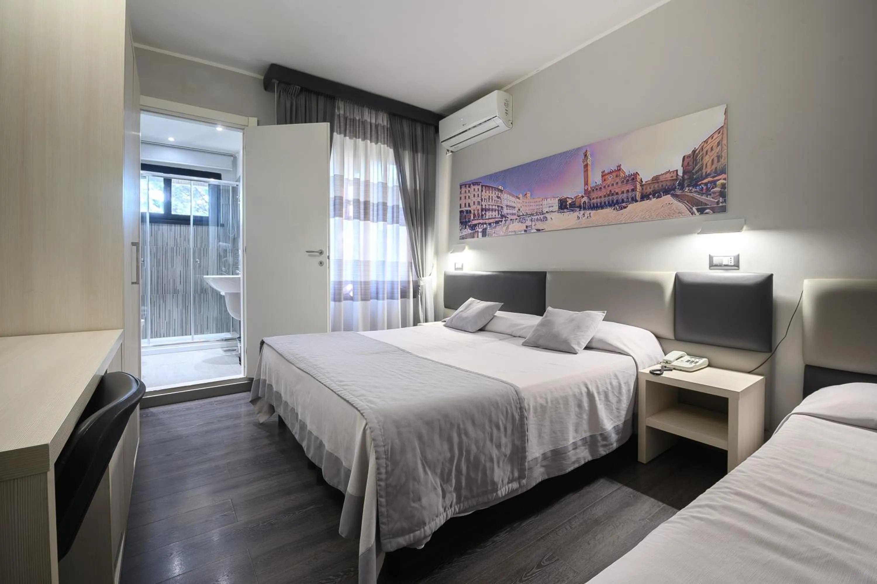 Bed in Hotel Anna Siena Nord