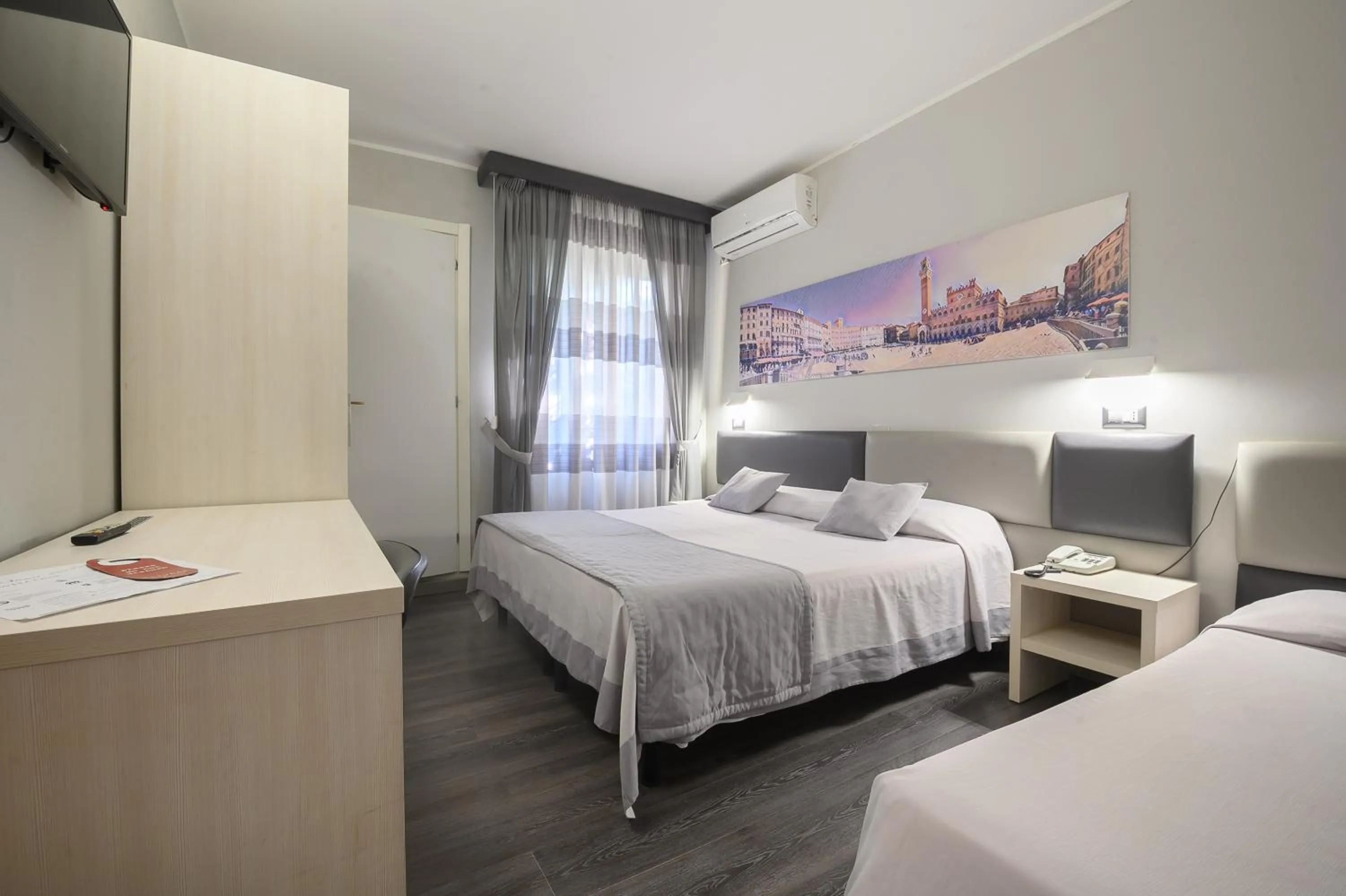 Bed in Hotel Anna Siena Nord