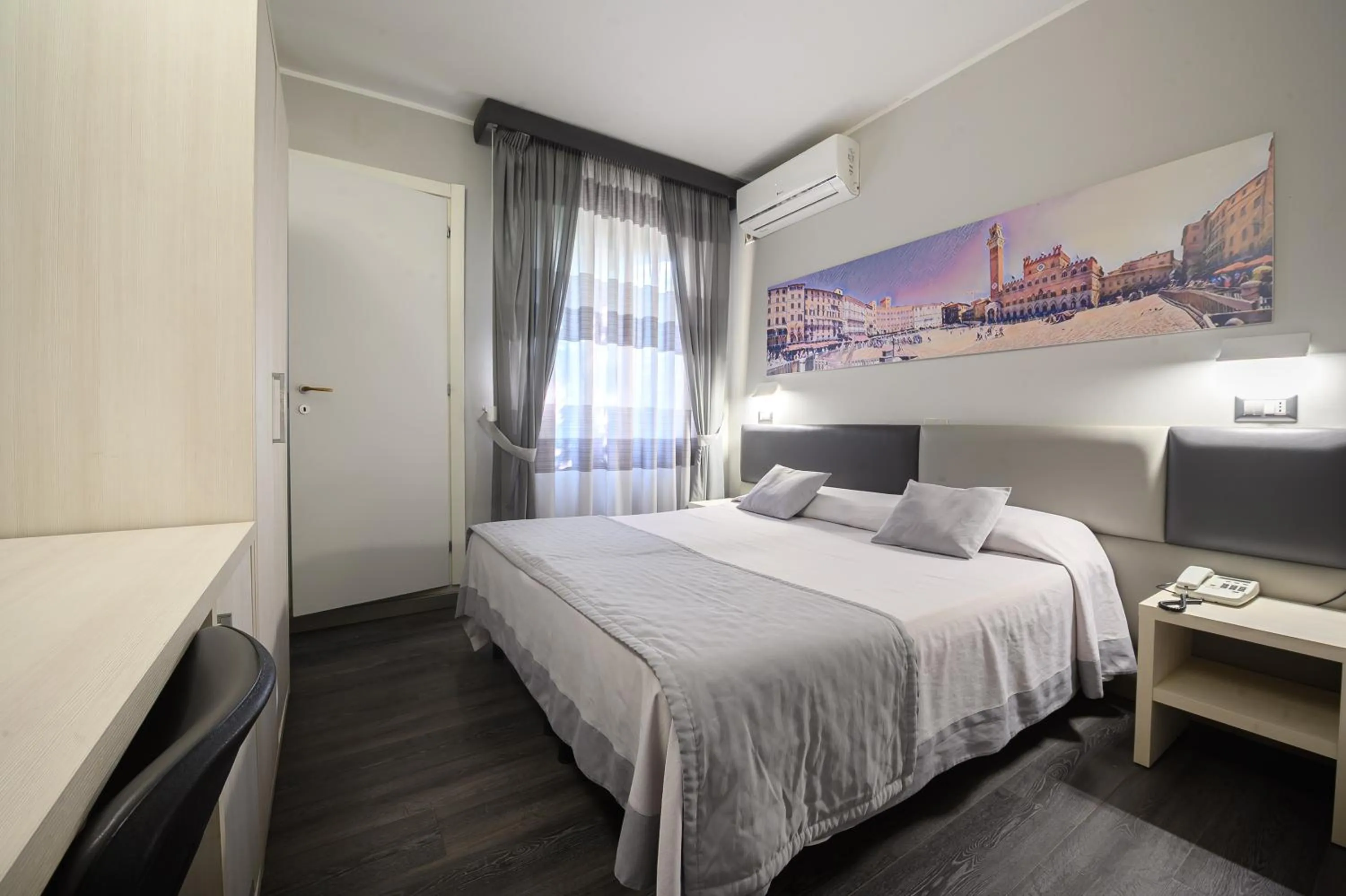 Bed in Hotel Anna Siena Nord