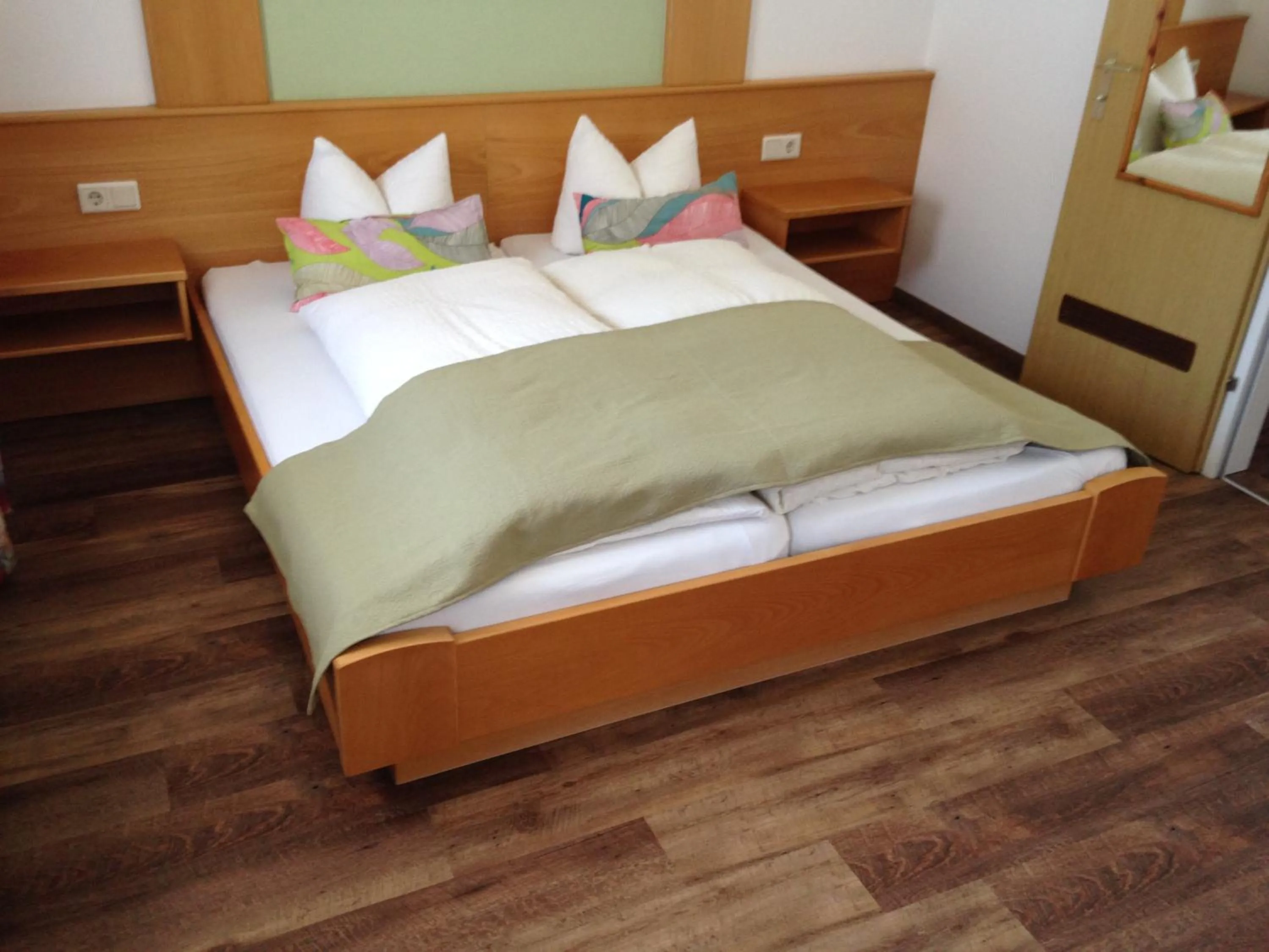Bed in Hotel Erika