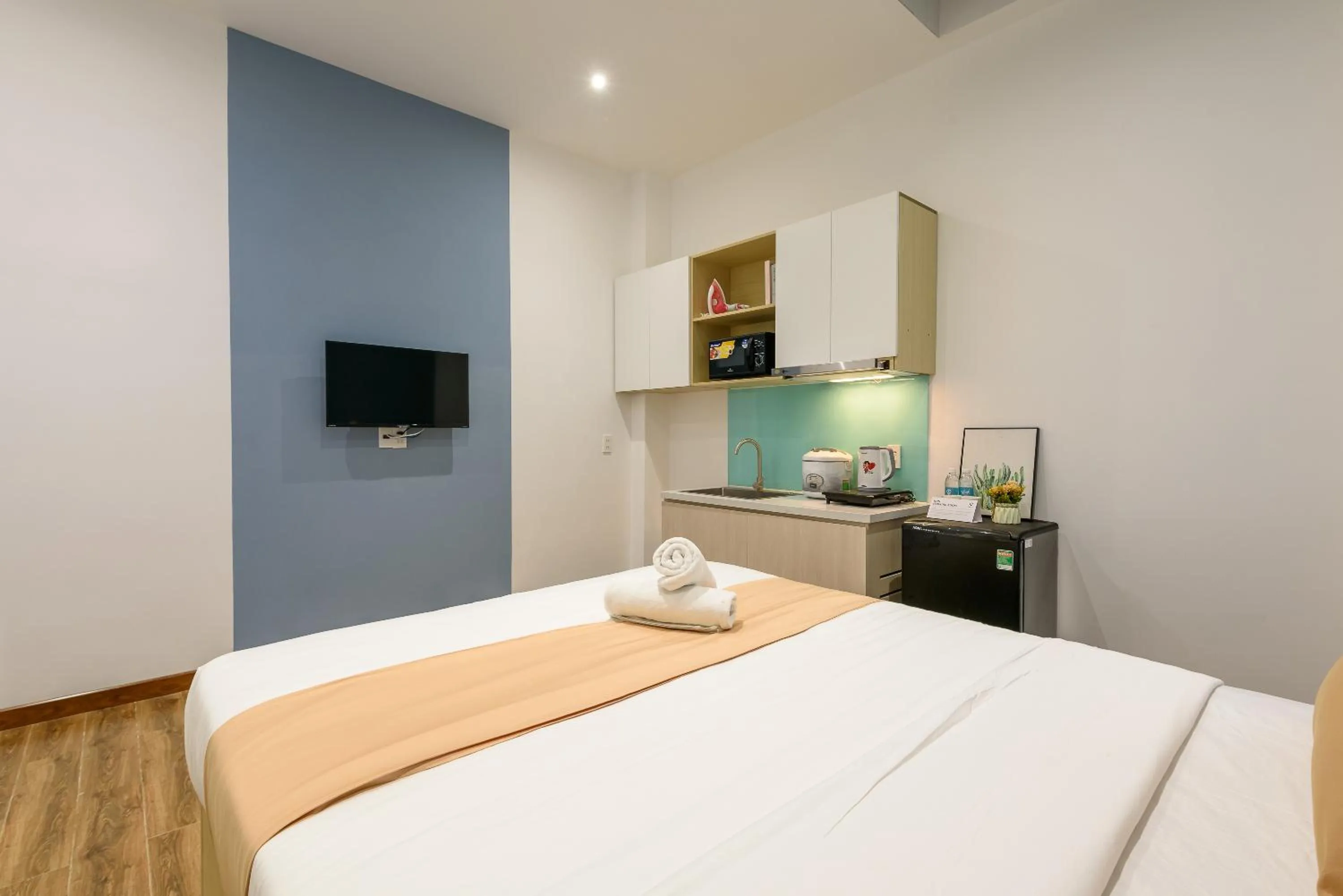 Bed in Cozrum Homes - June Corner