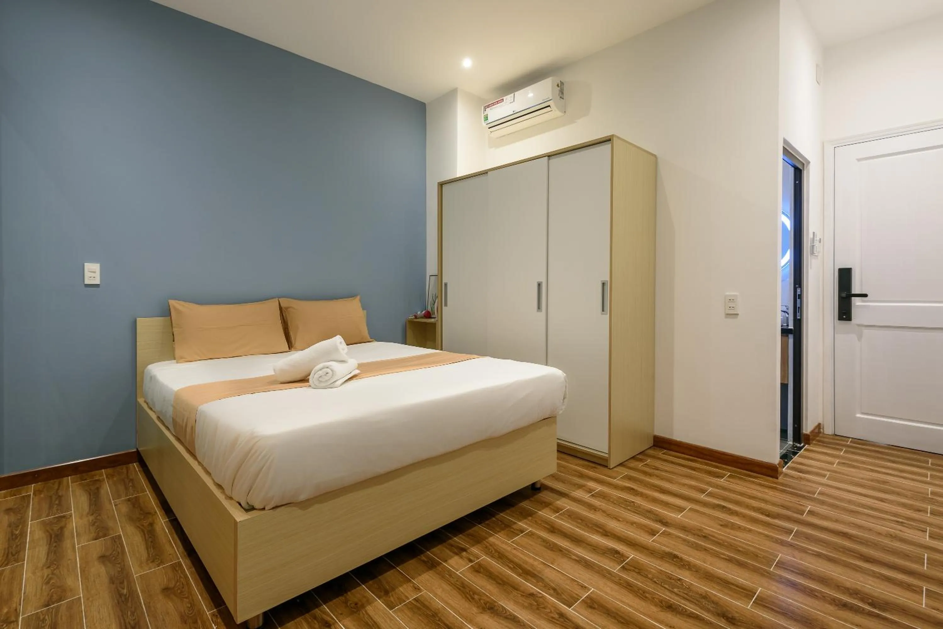 Bed in Cozrum Homes - June Corner