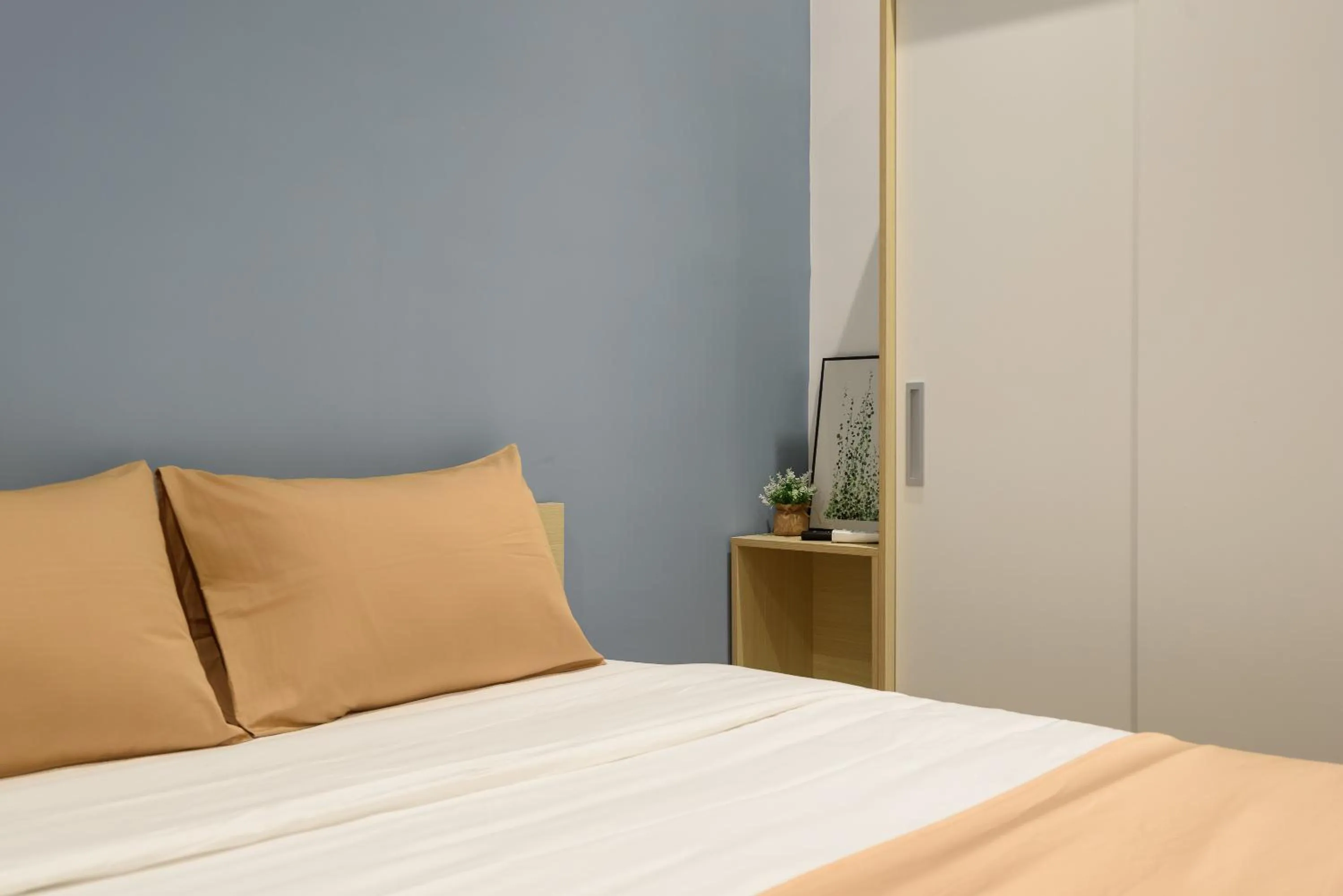 Bed in Cozrum Homes - June Corner