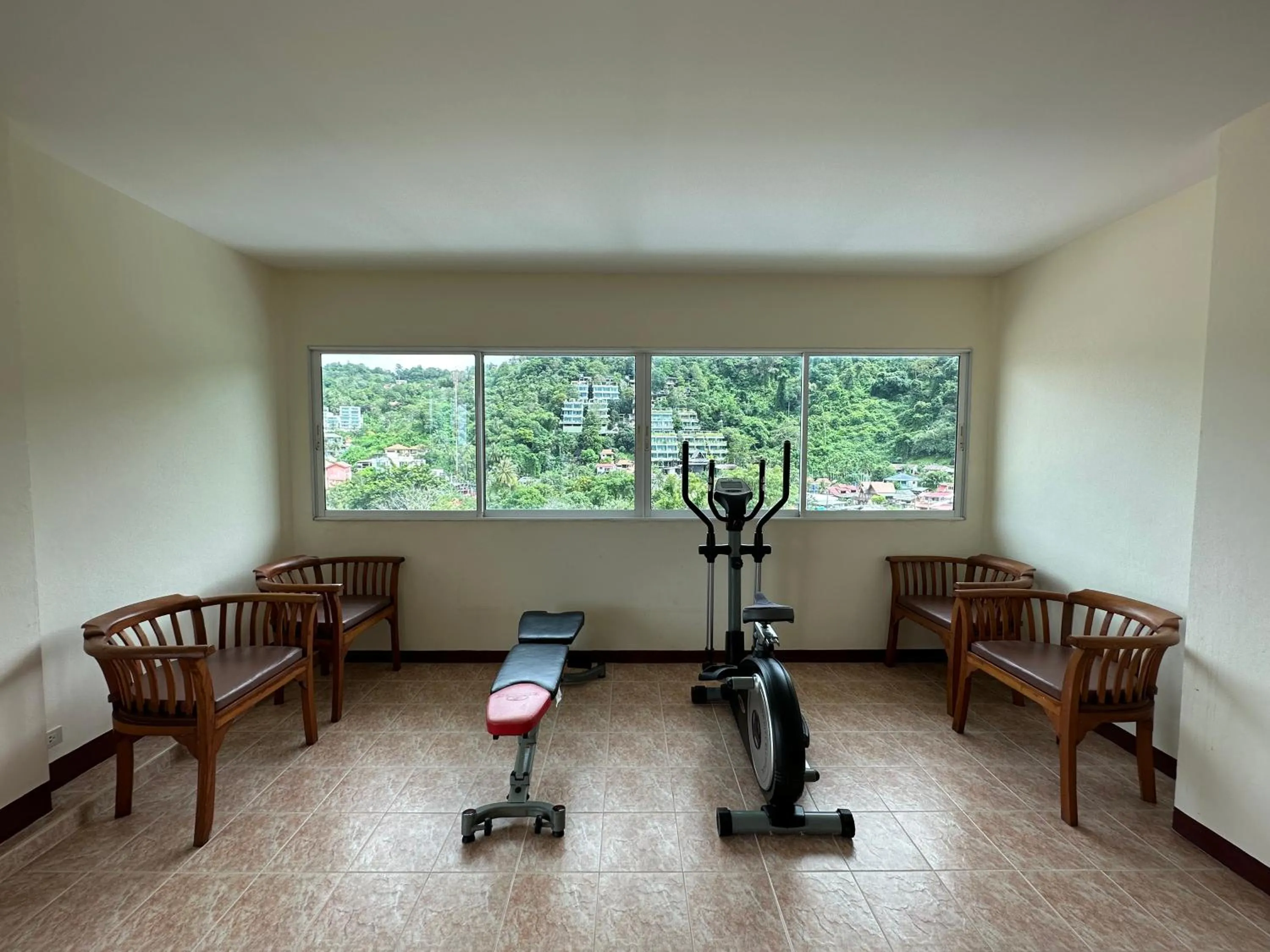 Fitness centre/facilities in Kata Place Hotel