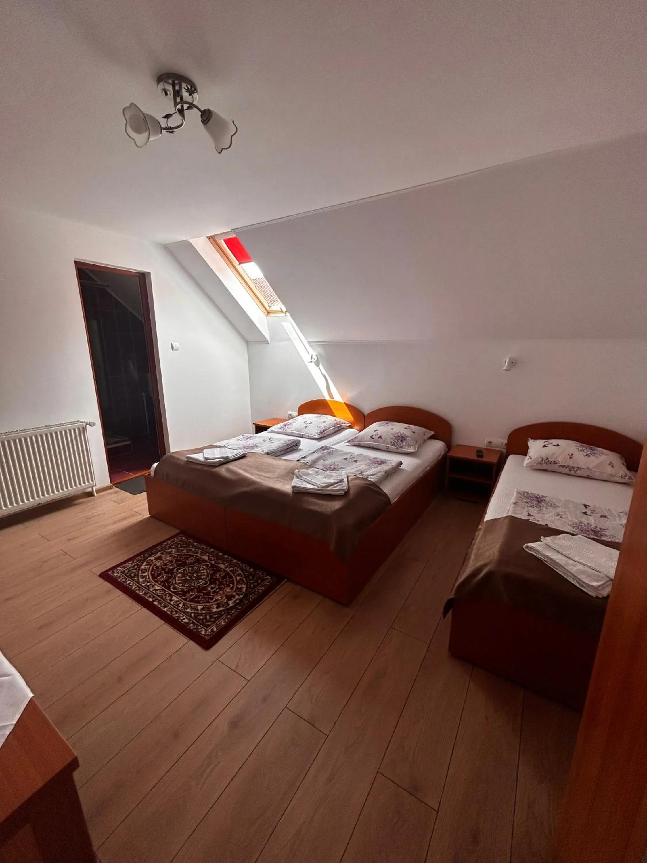 Bed in PENSIUNEA KELEMEN