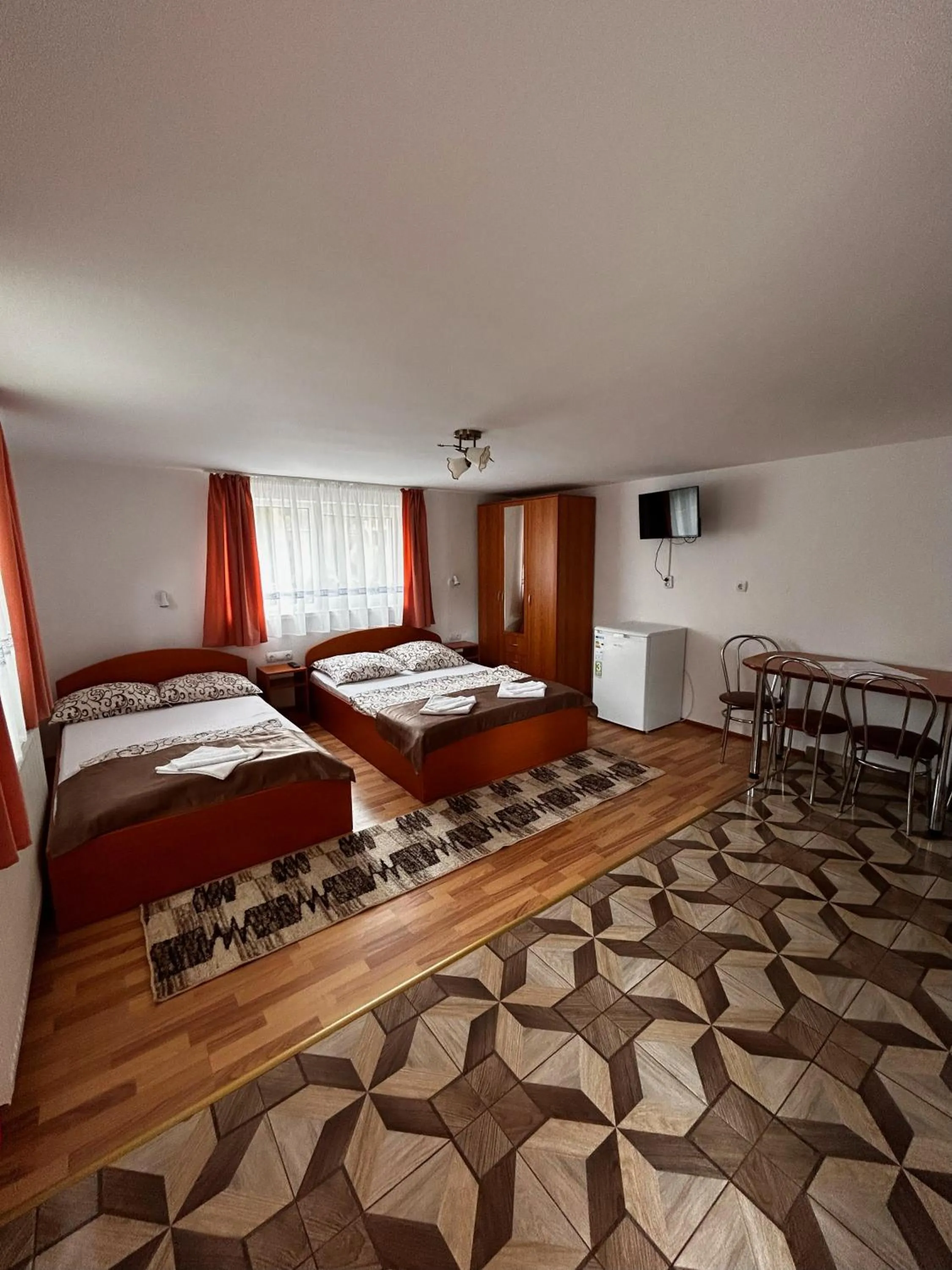 Bed in PENSIUNEA KELEMEN