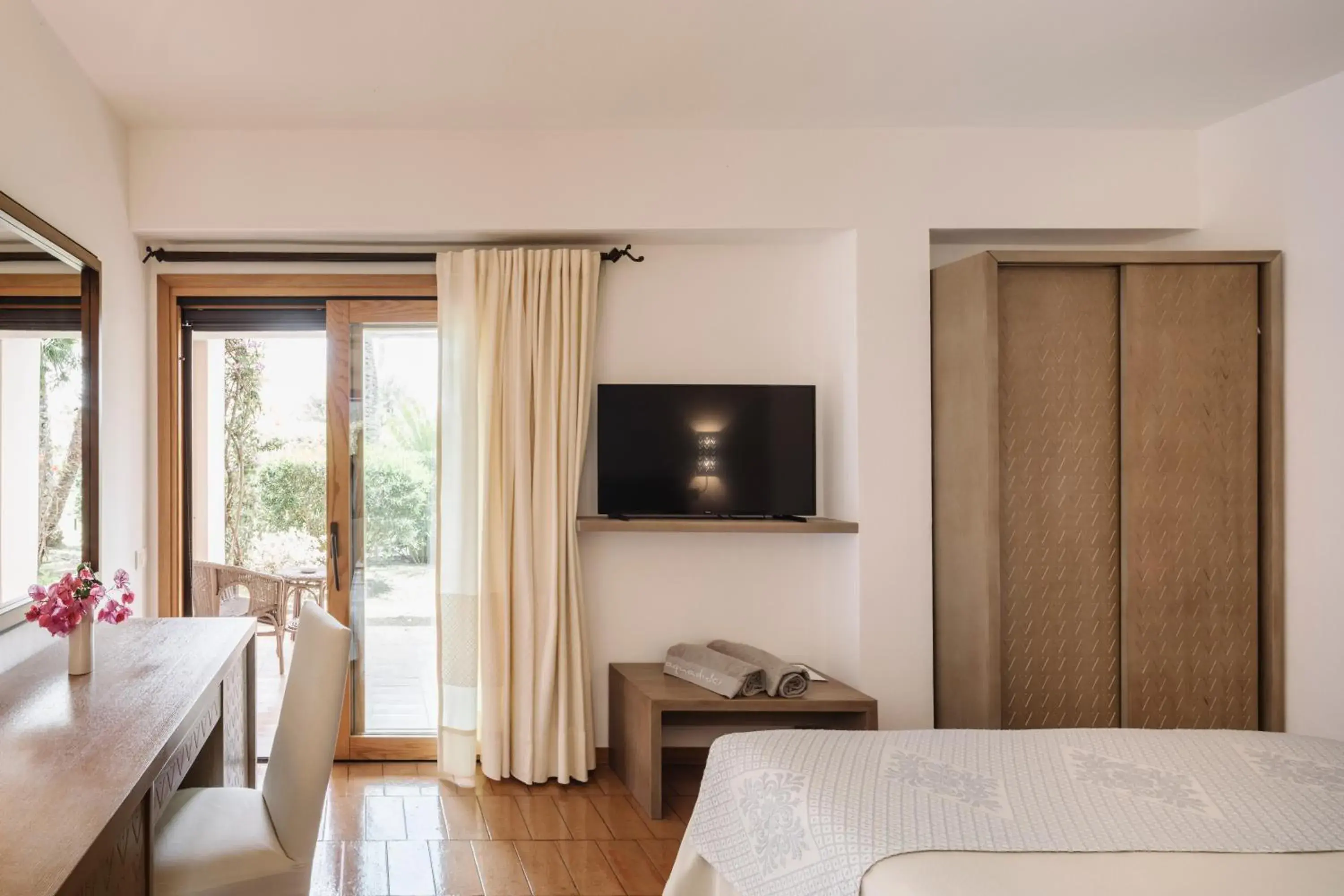 Superior Room with Garden View in Hotel Aquadulci Superior Room with Garden View in Hotel Aquadulci