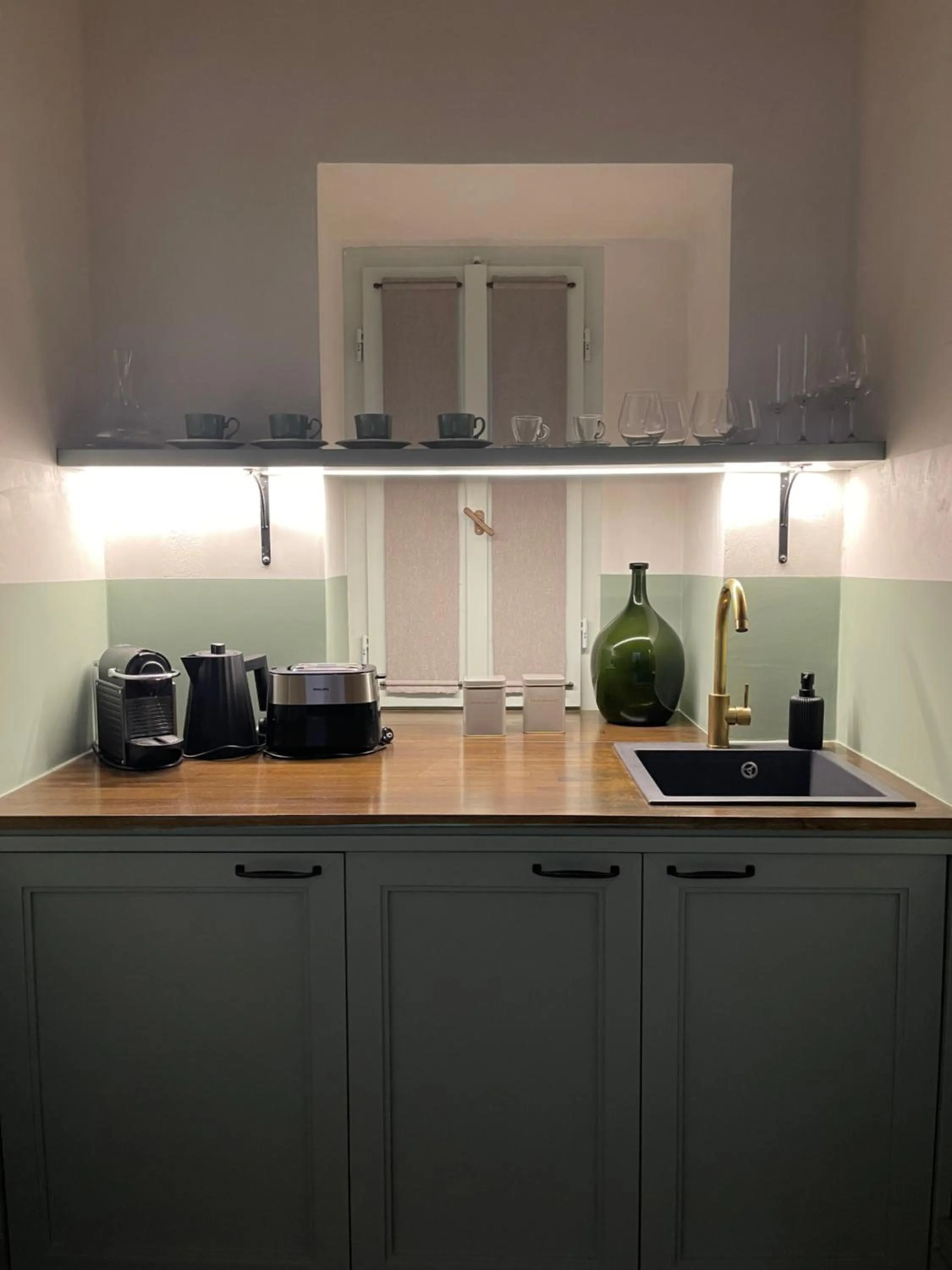 Kitchen or kitchenette in ATHINAIDOS QUARTERS by K&K