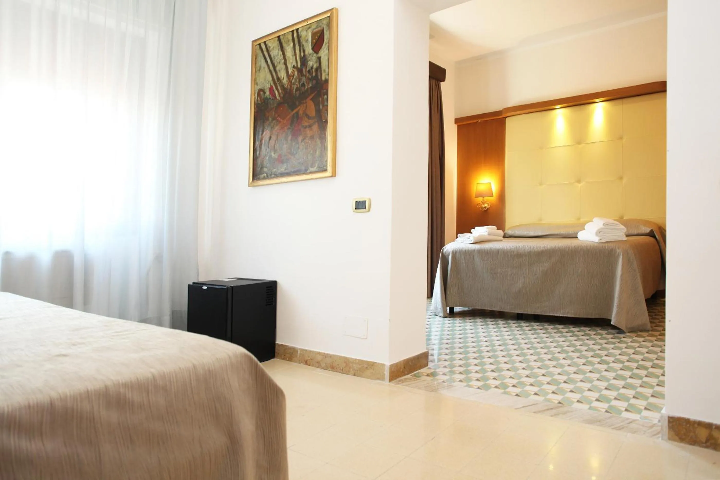 Photo of the whole room, Bed in Albergo Russo