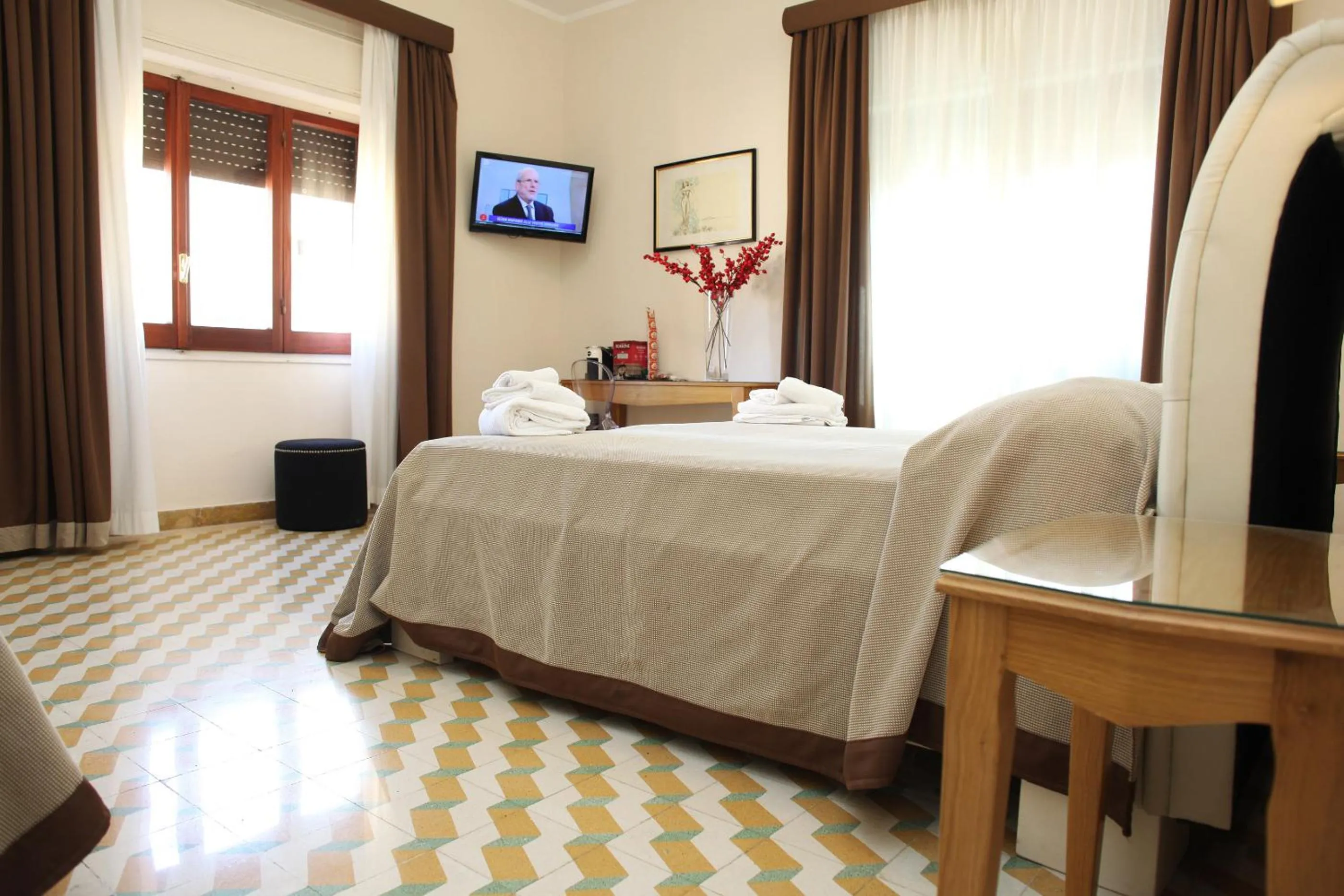 Photo of the whole room, Bed in Albergo Russo
