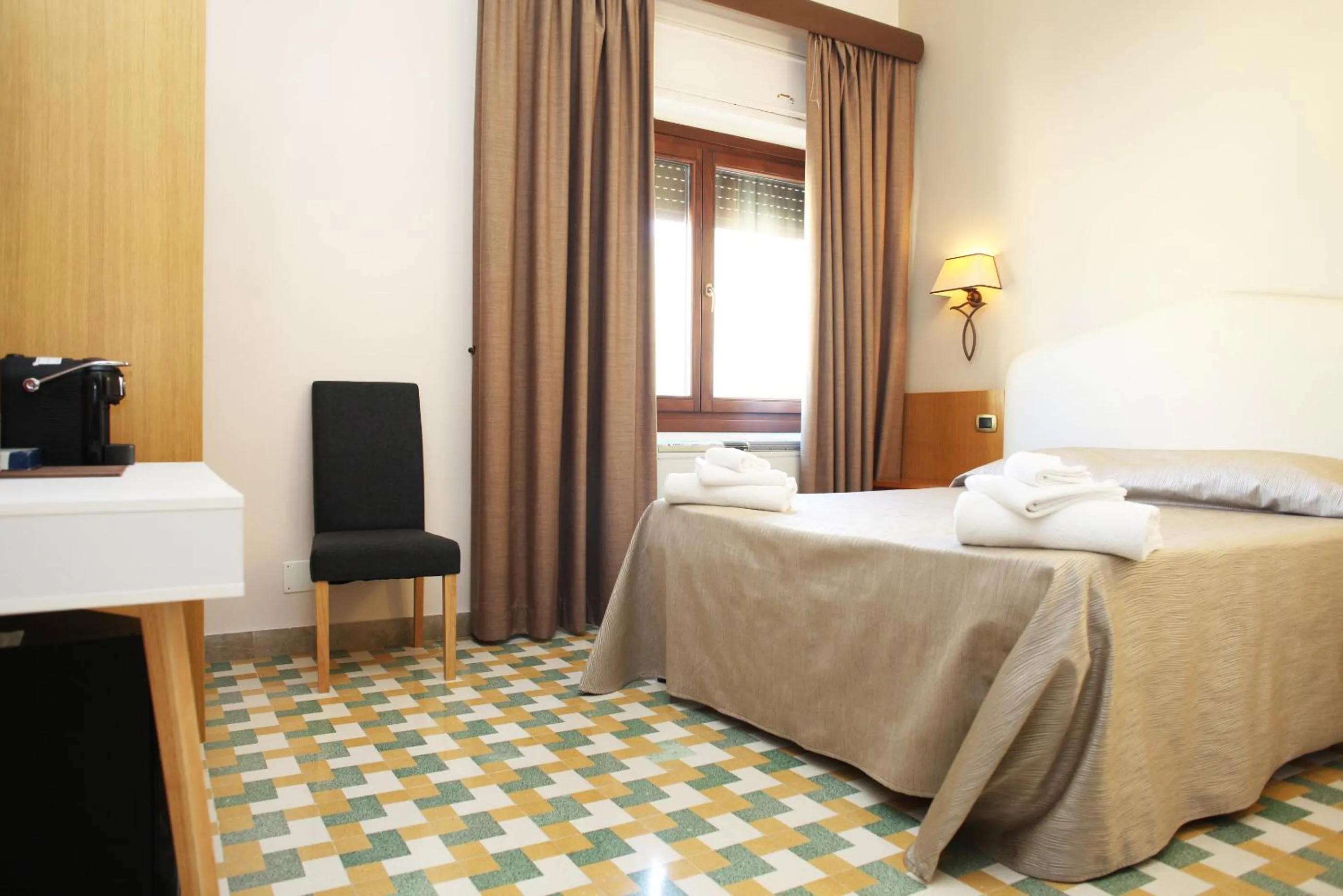 Photo of the whole room, Bed in Albergo Russo
