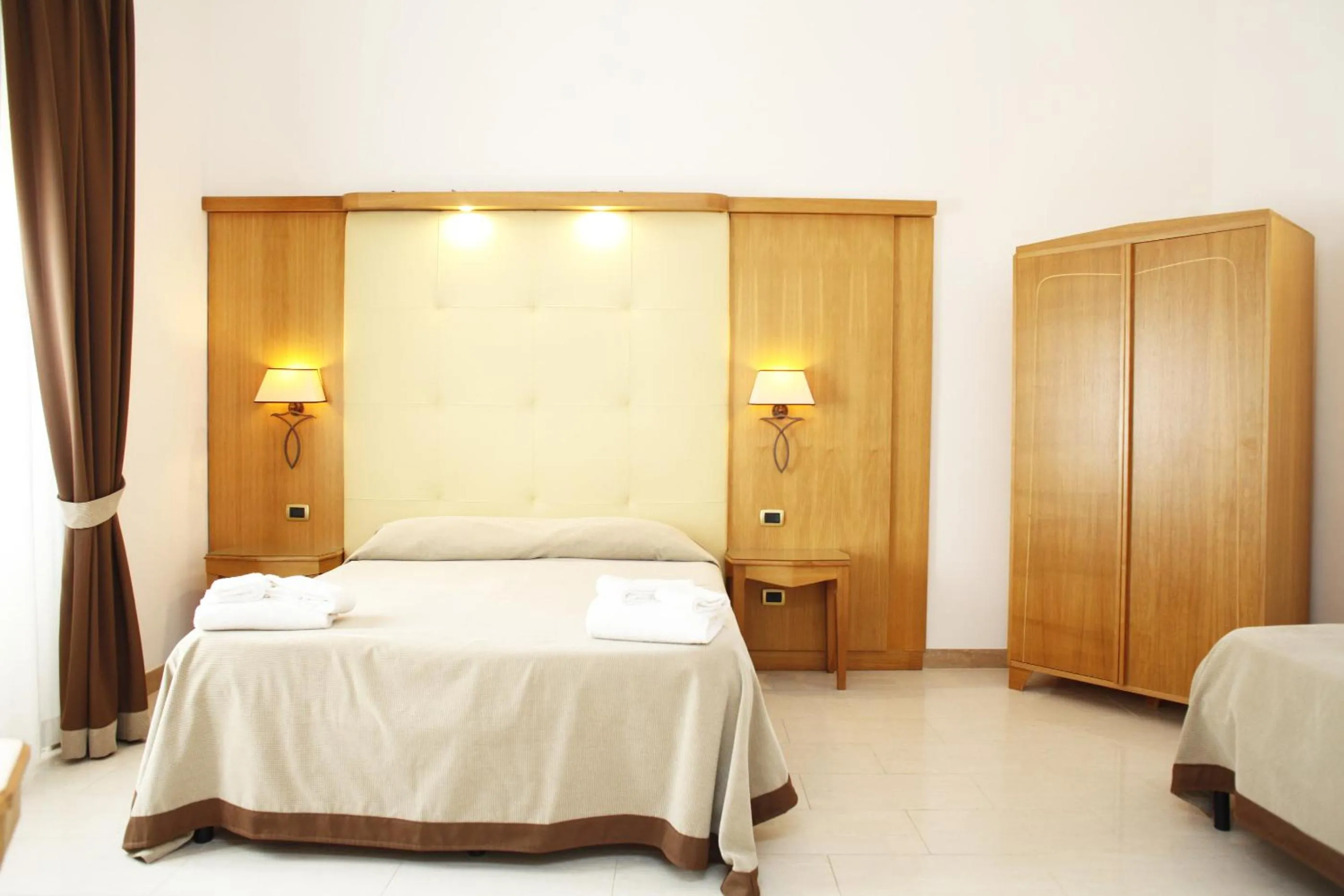 Photo of the whole room, Bed in Albergo Russo