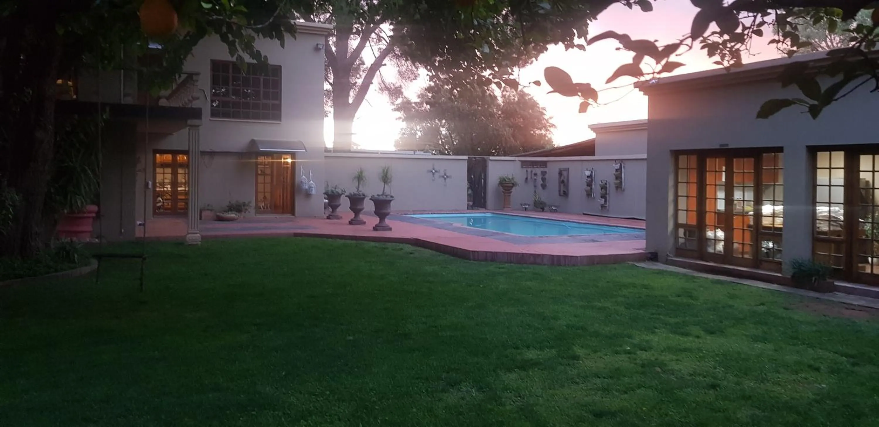 Swimming pool in De Stallen Guest Villas and Golf Course