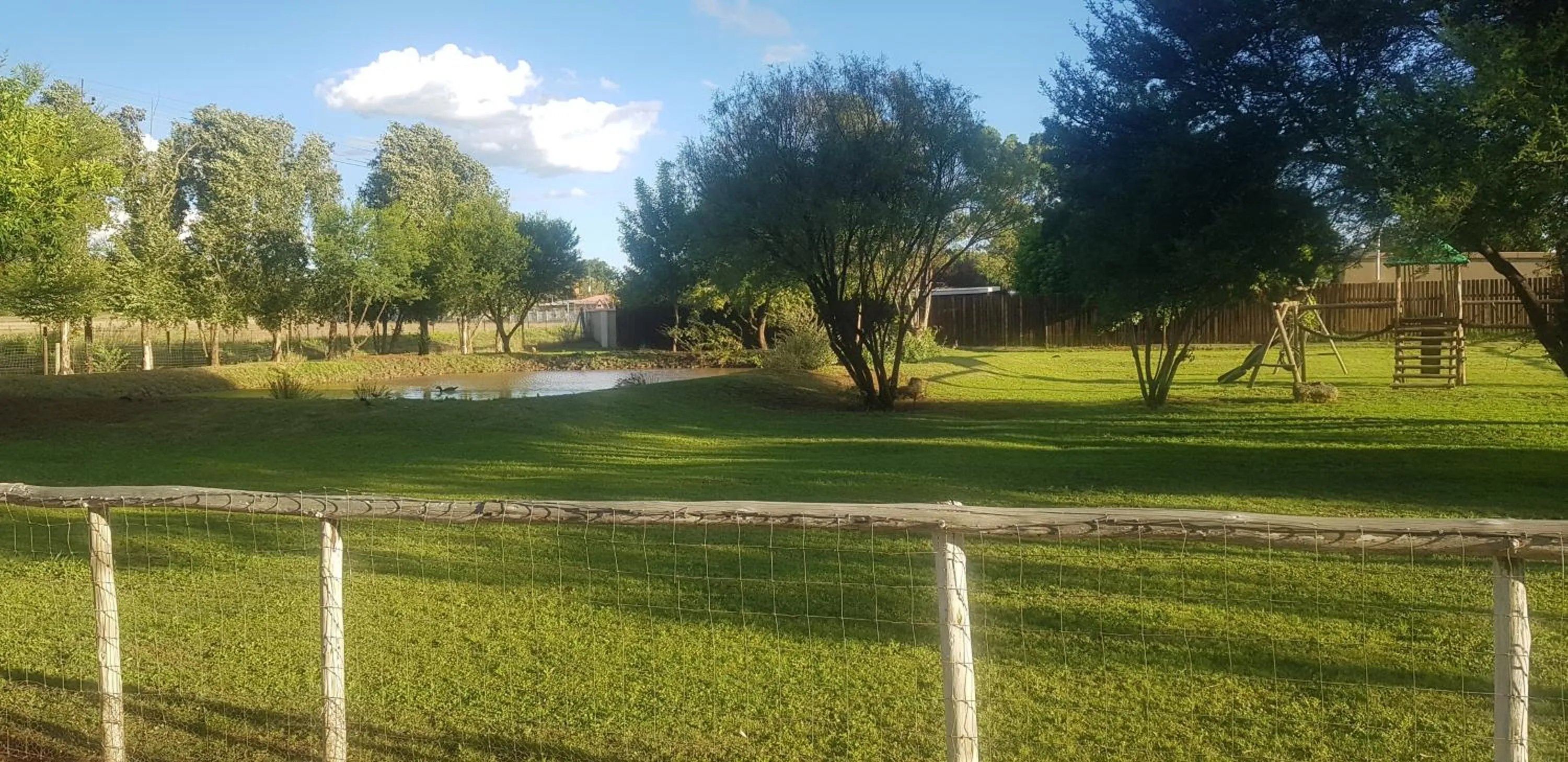 Garden view in De Stallen Guest Villas and Golf Course