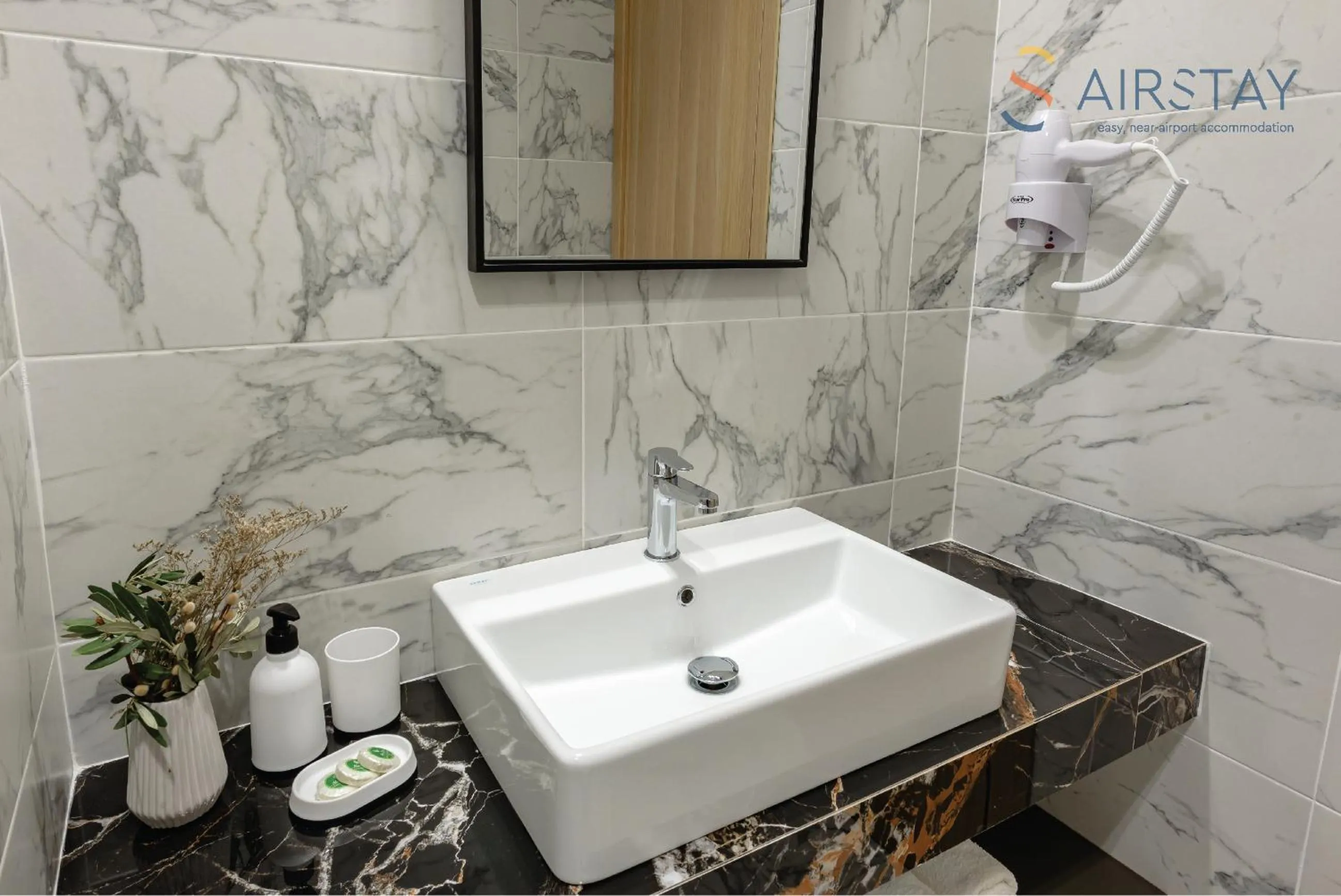 Shower in Zed Smart Property Airport by Airstay