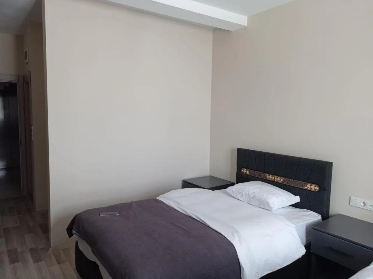 Bed in ATLIHAN PLUS HOTEL