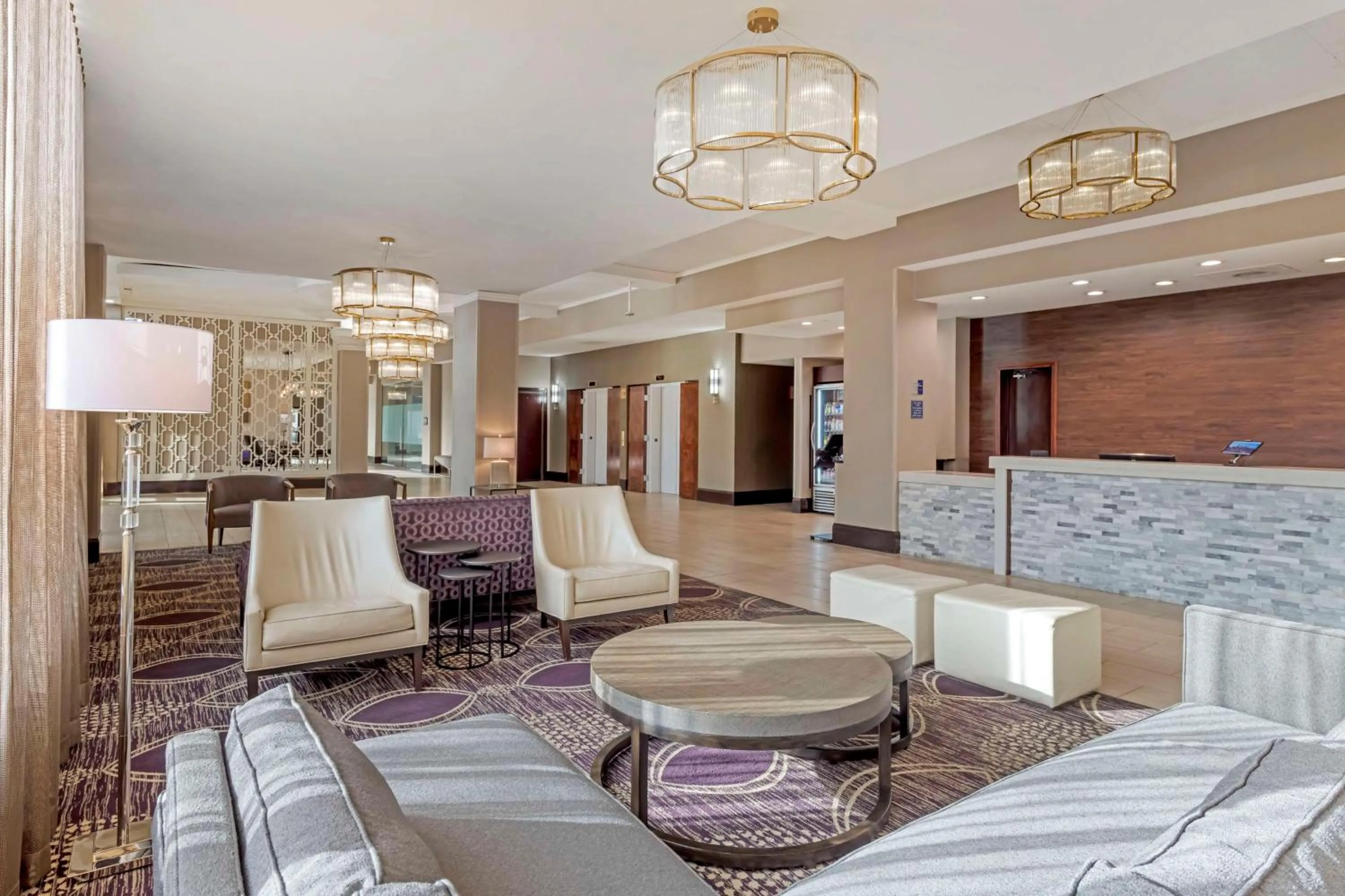 Communal lounge/ TV room in Best Western Brooklyn Center Hotel & Conference Center