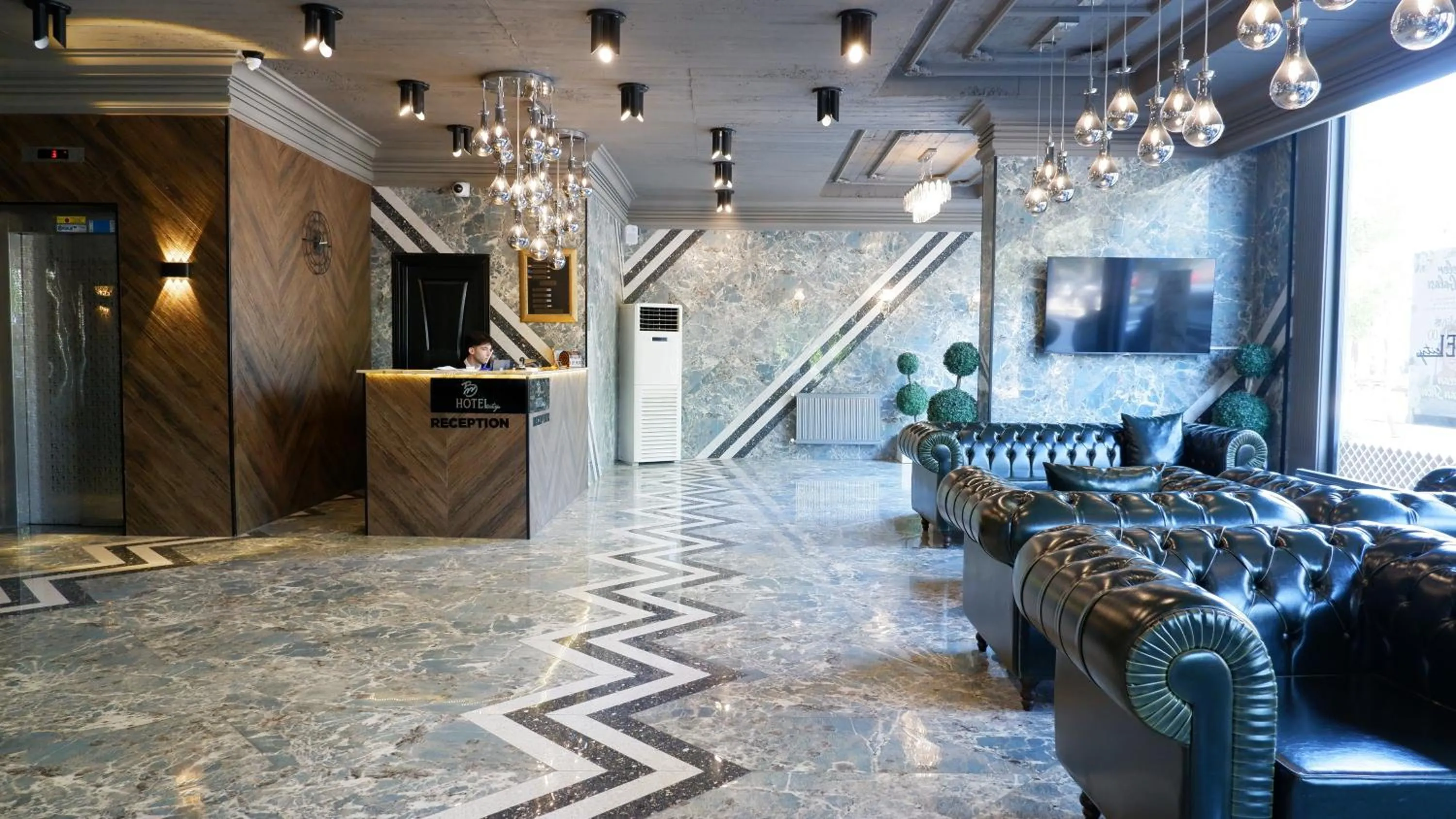 Lobby or reception in Amisos Hotel