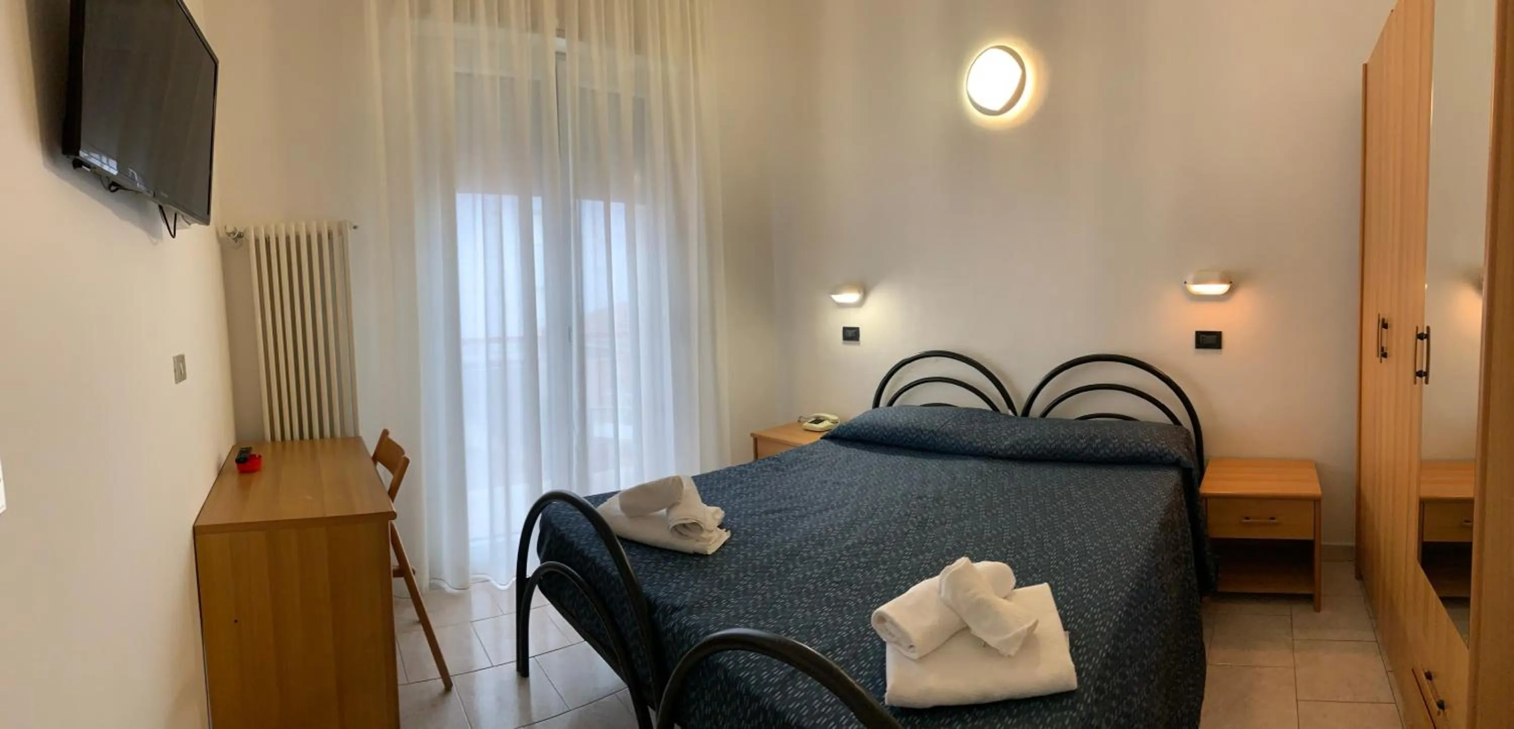 Bed in Hotel Marylise