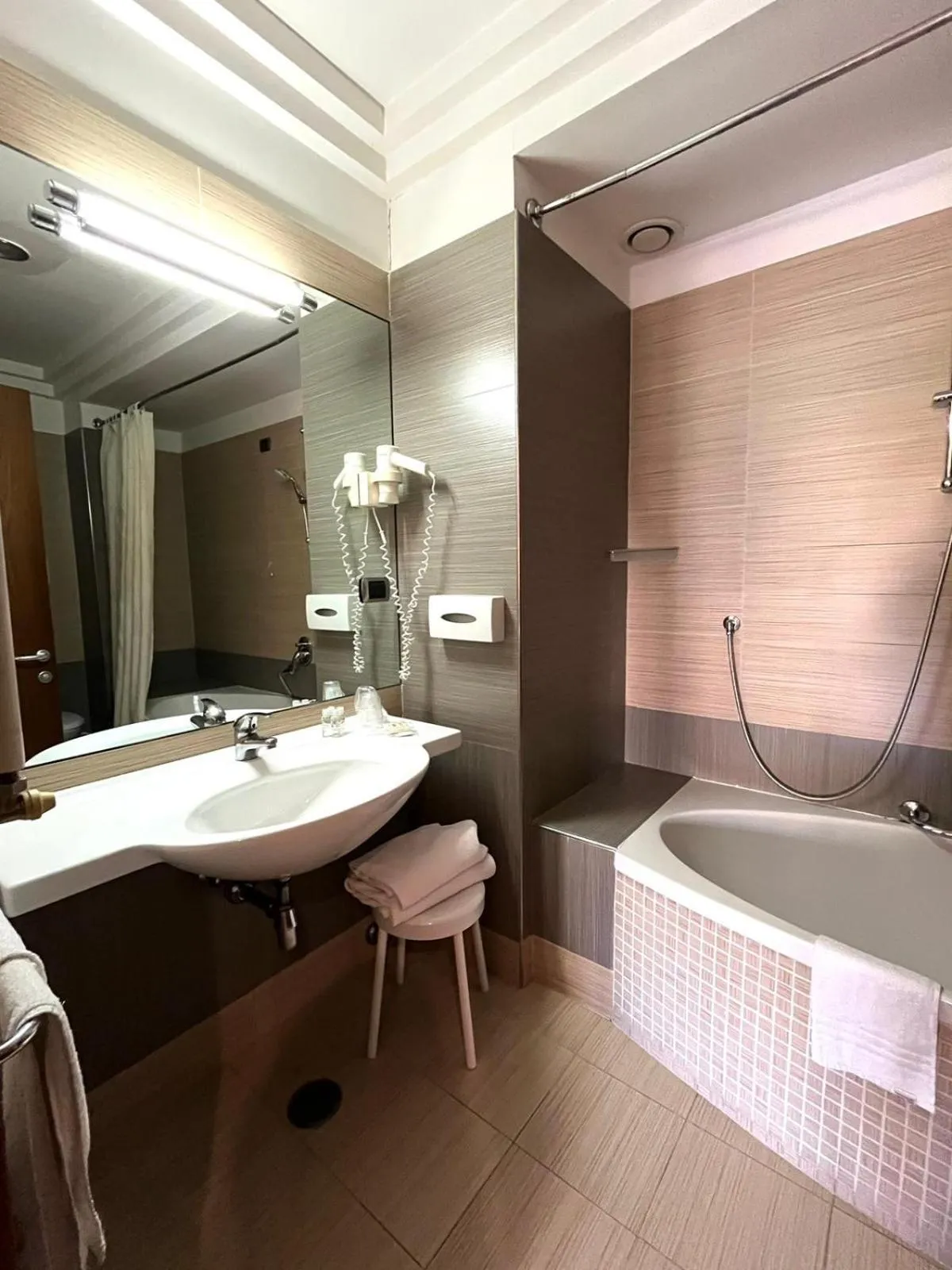Bathroom in Suites & Residence Hotel