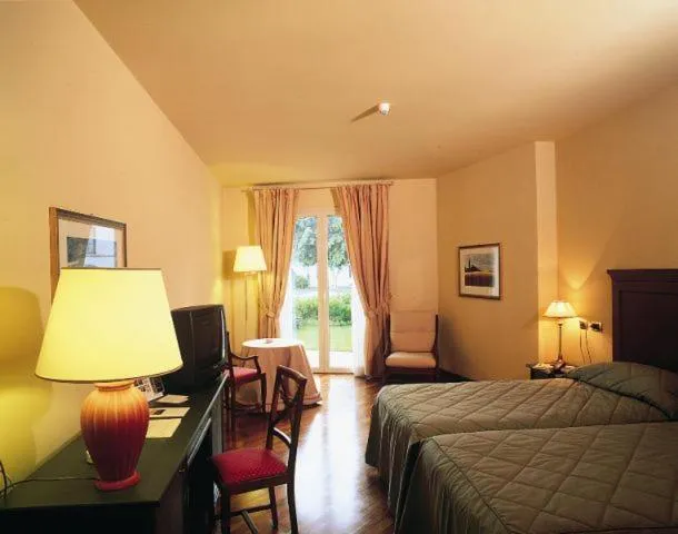 Bed in Grand Hotel Baia Verde