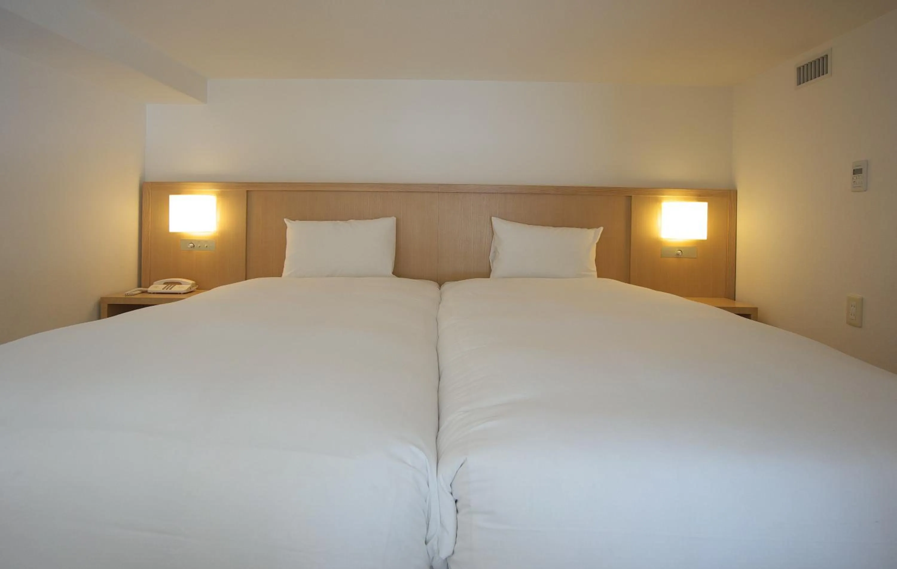 Bed in Hotel Marinoa Resort Fukuoka