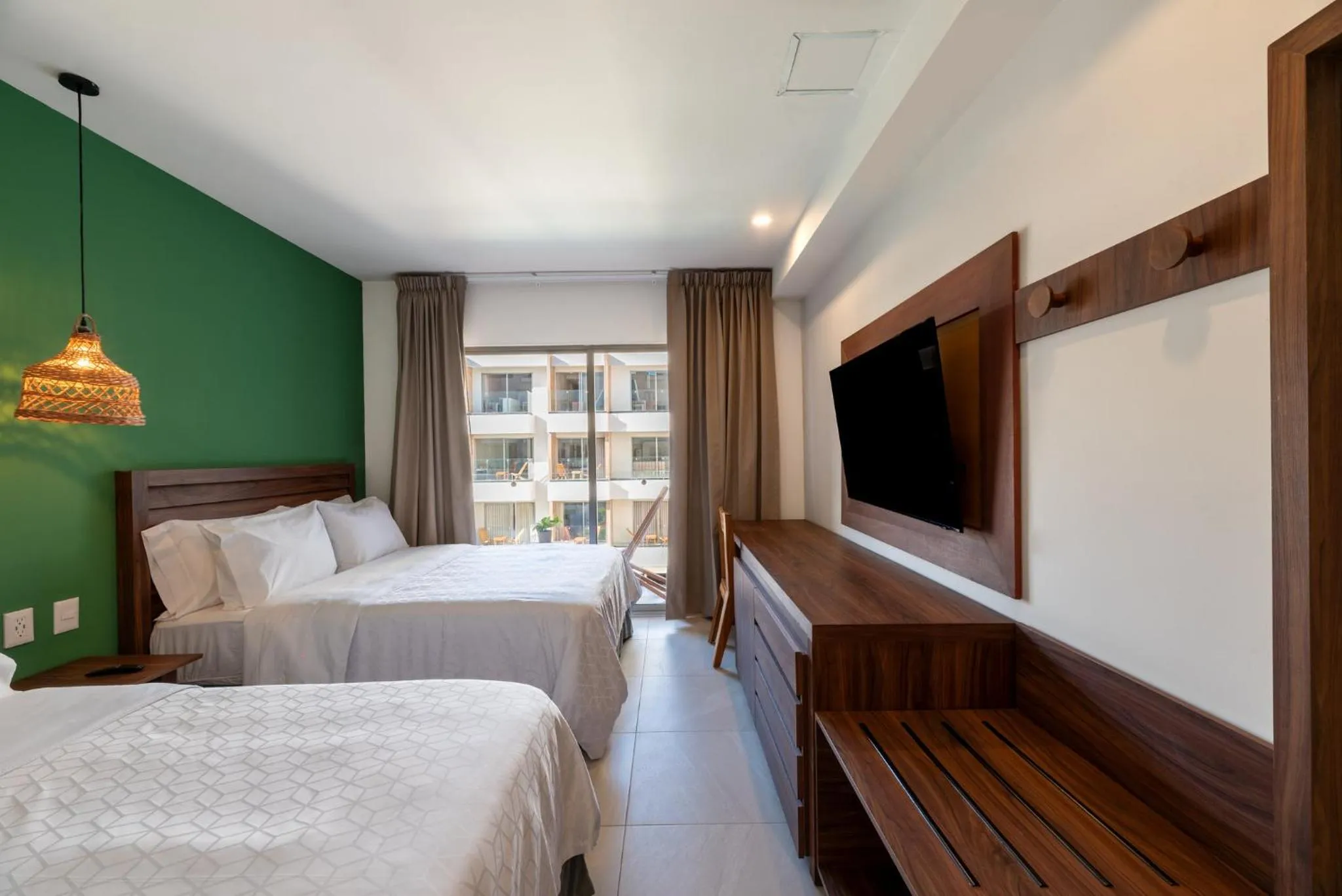 Photo of the whole room, Bed in Holiday Inn Tulum by IHG