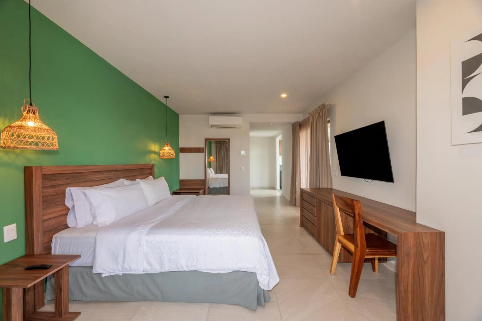 Photo of the whole room, Bed in Holiday Inn Tulum by IHG