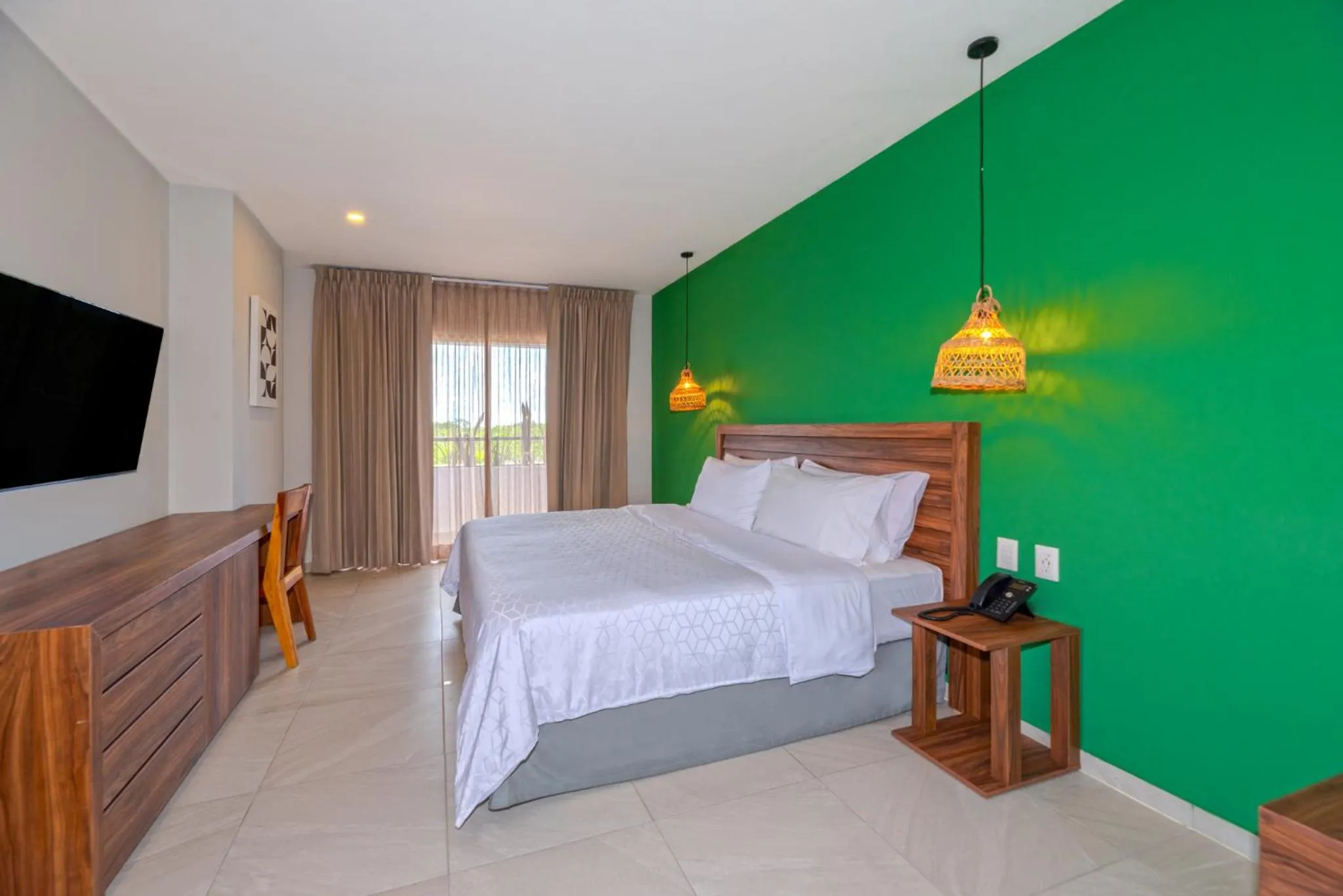 Photo of the whole room, Bed in Holiday Inn Tulum by IHG