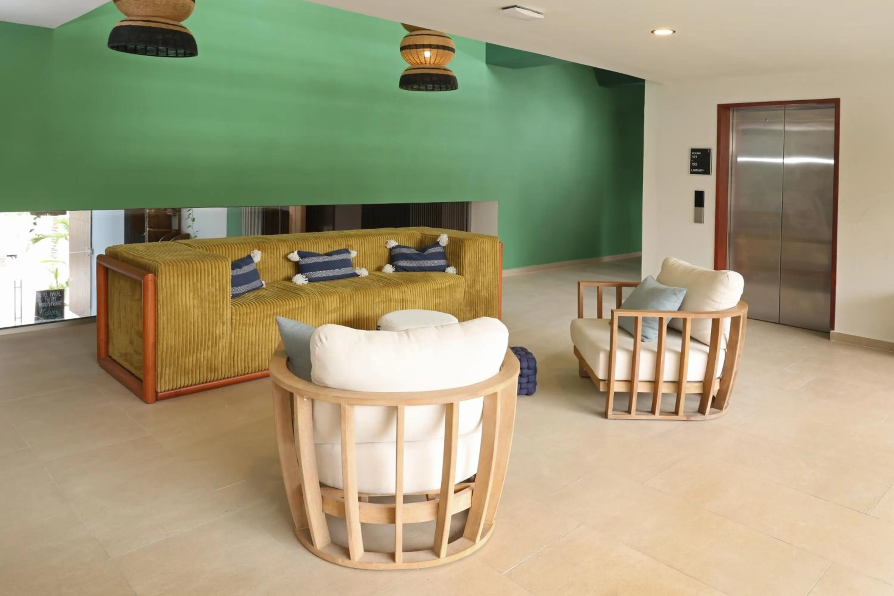 Living room in Holiday Inn Tulum by IHG