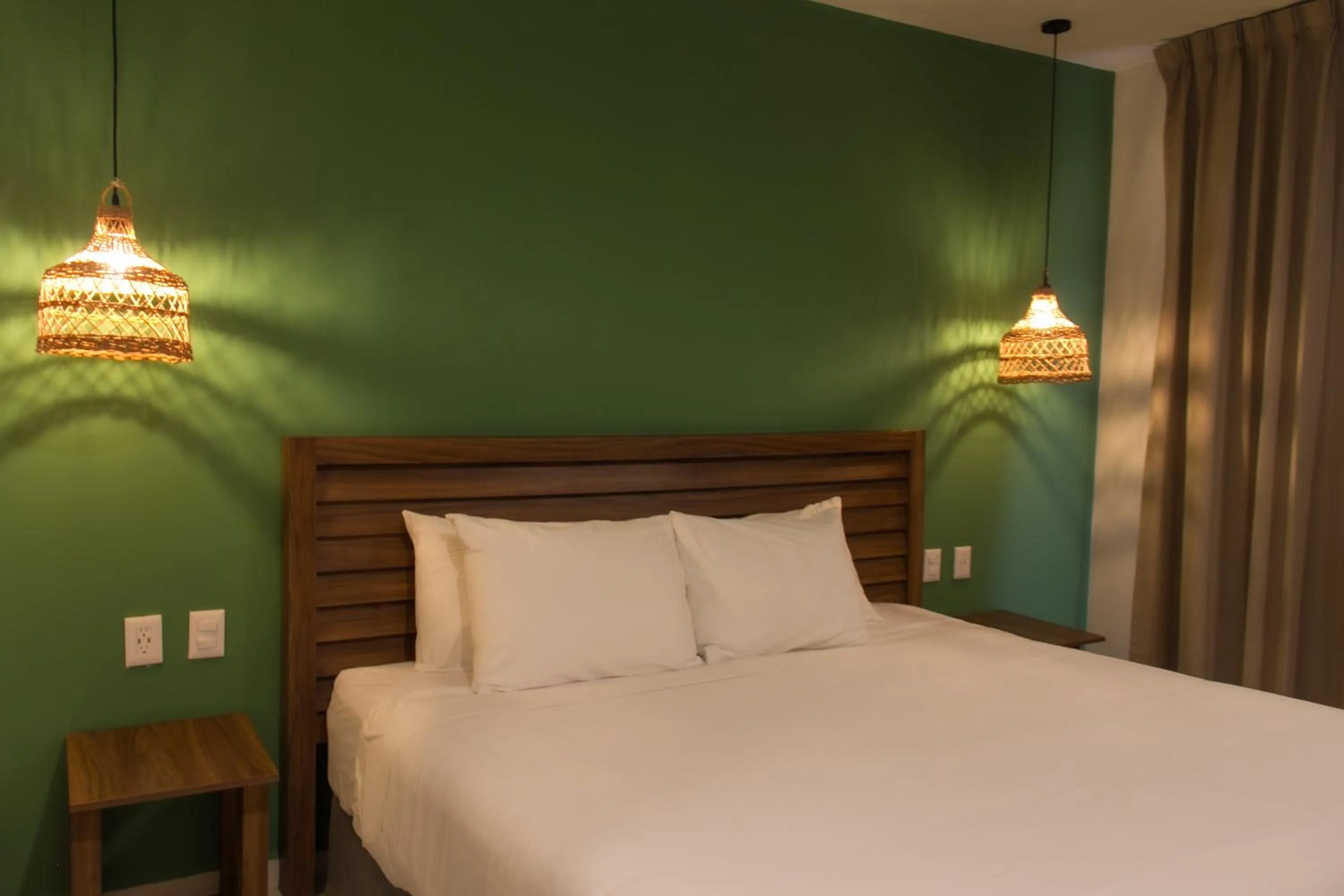 Photo of the whole room, Bed in Holiday Inn Tulum by IHG