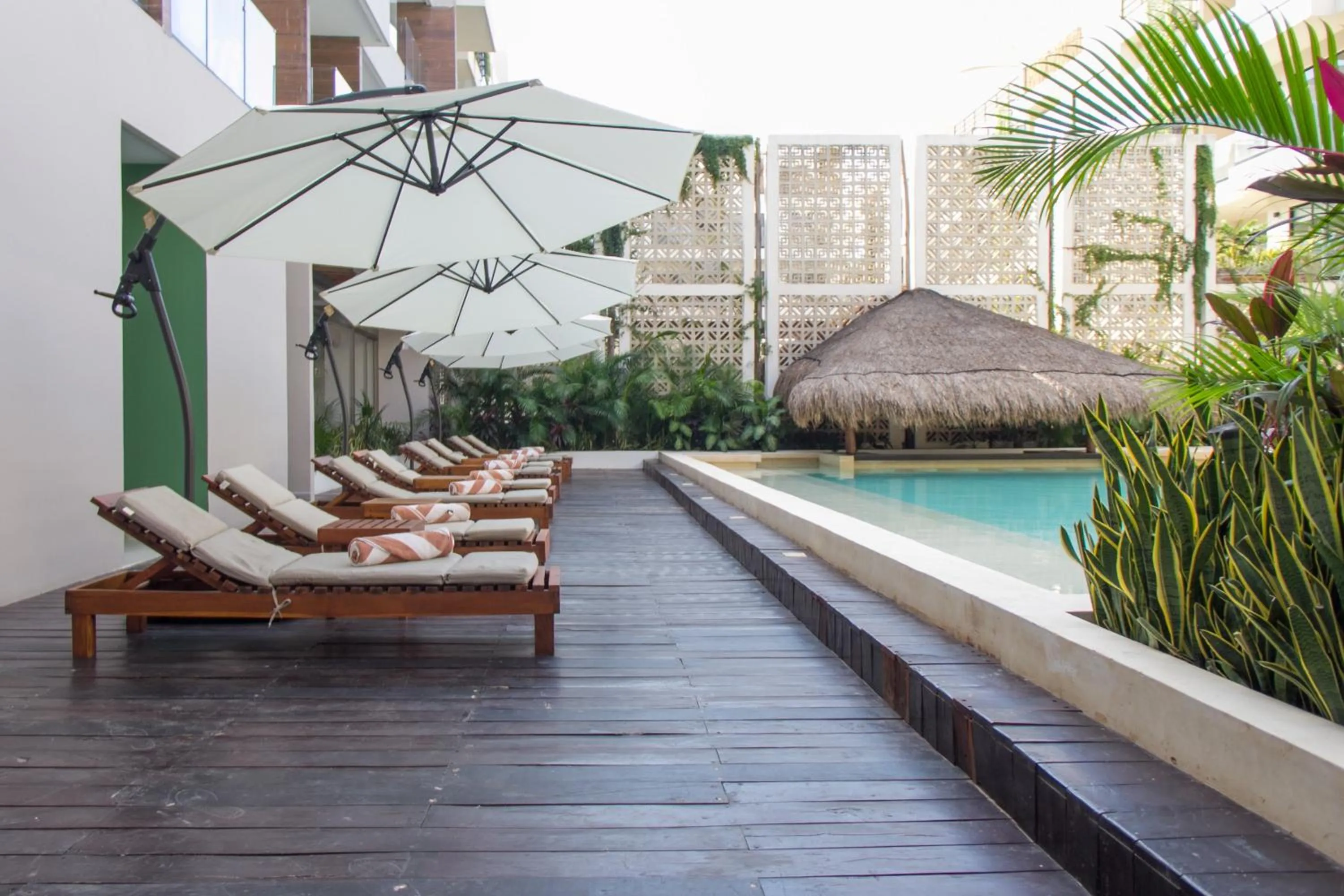 Swimming pool in Holiday Inn Tulum by IHG