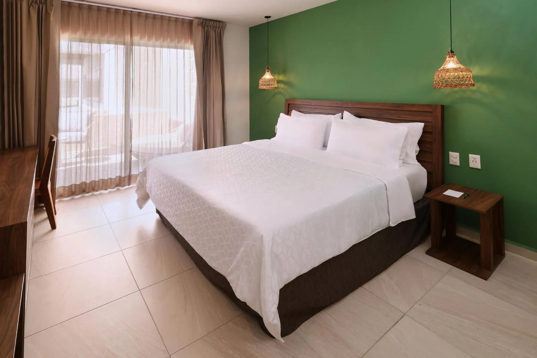 Photo of the whole room, Bed in Holiday Inn Tulum by IHG