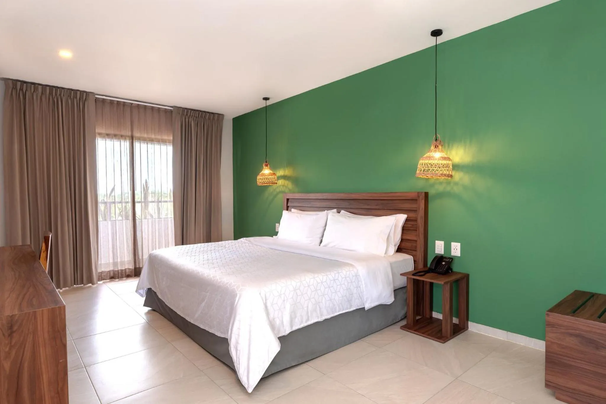 Photo of the whole room, Bed in Holiday Inn Tulum by IHG