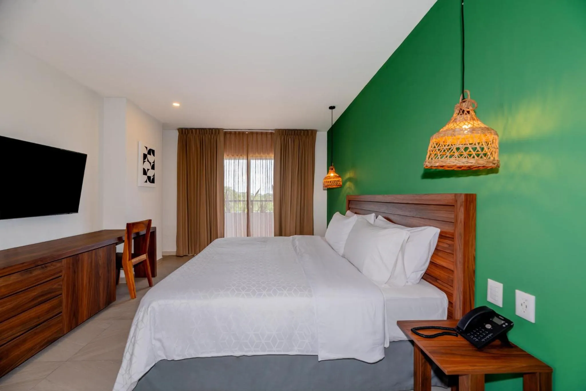 Photo of the whole room, Bed in Holiday Inn Tulum by IHG