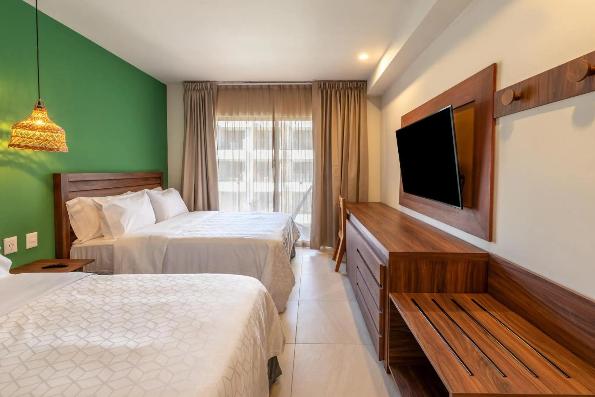 Photo of the whole room, Bed in Holiday Inn Tulum by IHG
