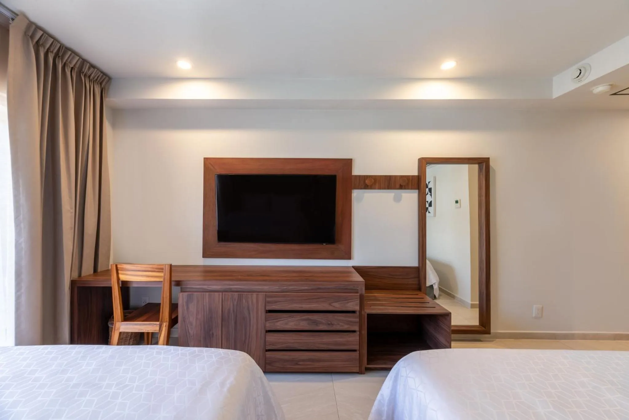 Photo of the whole room, Bed in Holiday Inn Tulum by IHG