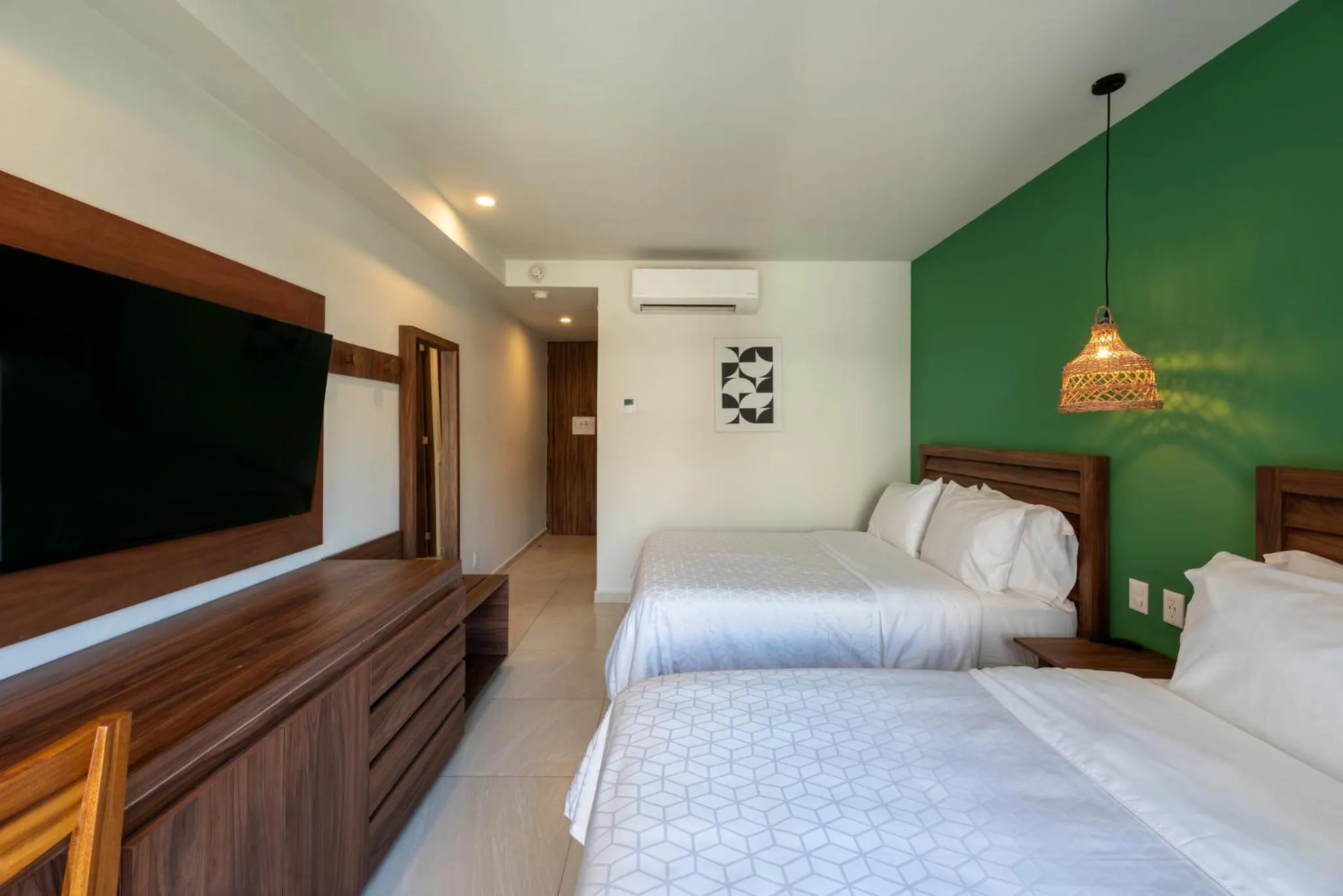 Photo of the whole room, Bed in Holiday Inn Tulum by IHG