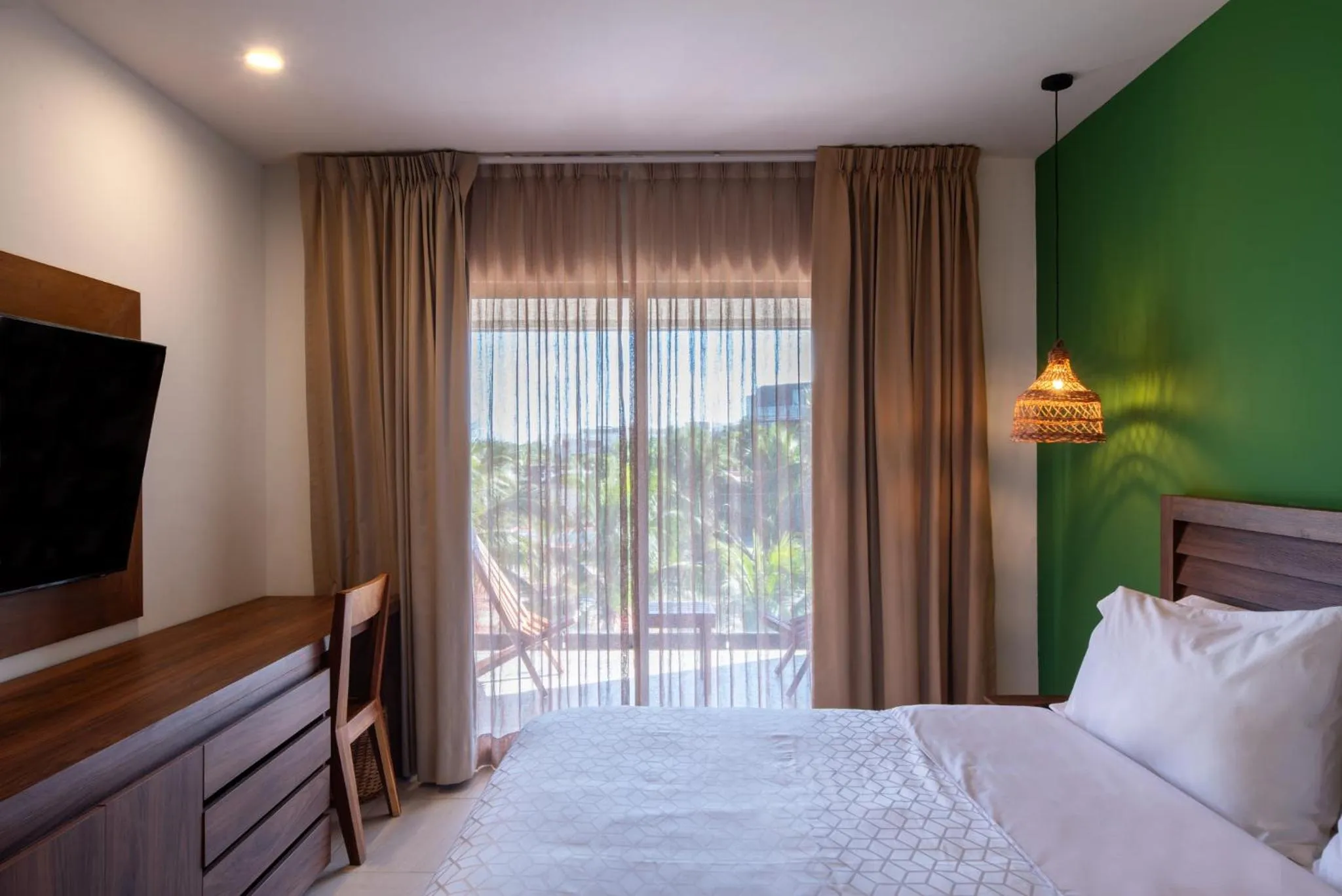 Photo of the whole room, Bed in Holiday Inn Tulum by IHG