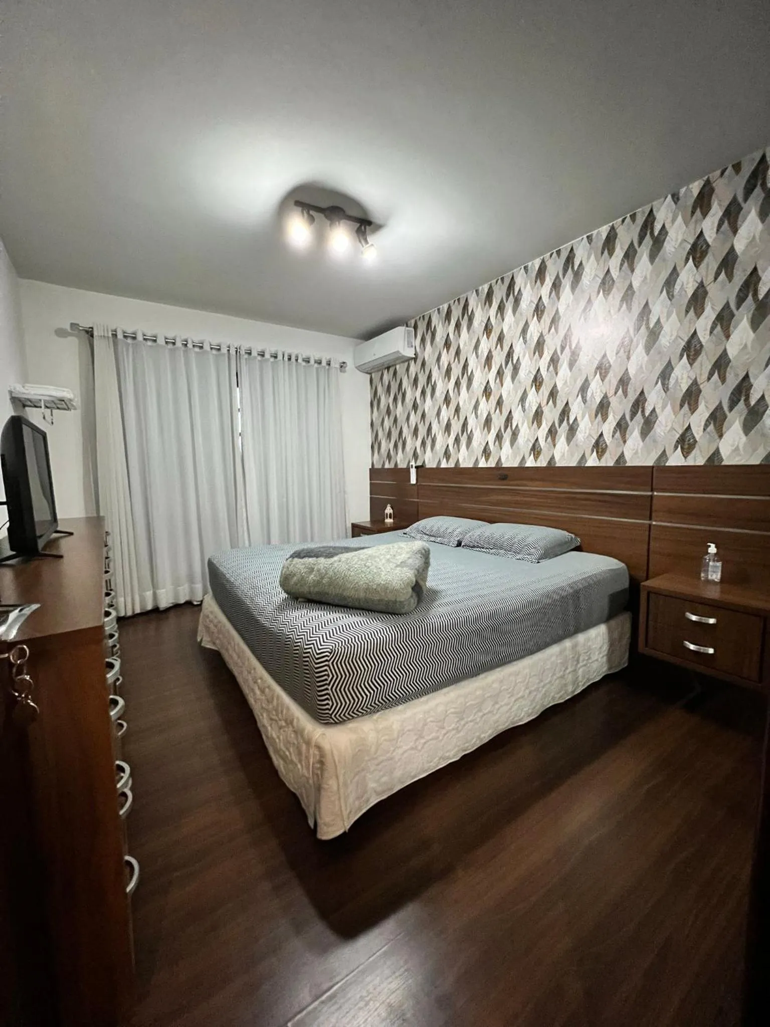 Bed in Pousada Central Jaraguá