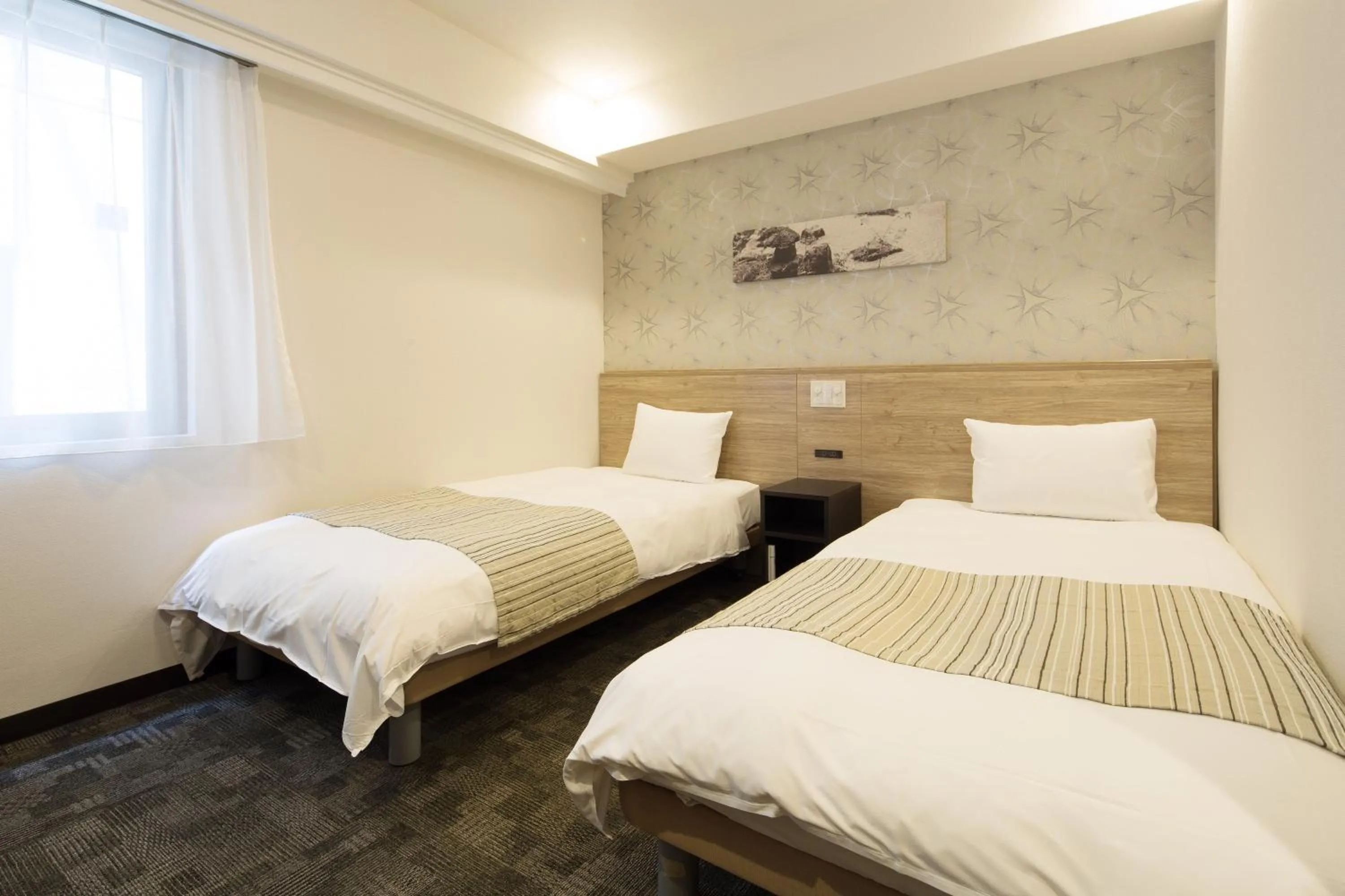 Photo of the whole room, Bed in Nest Hotel Osaka Shinsaibashi