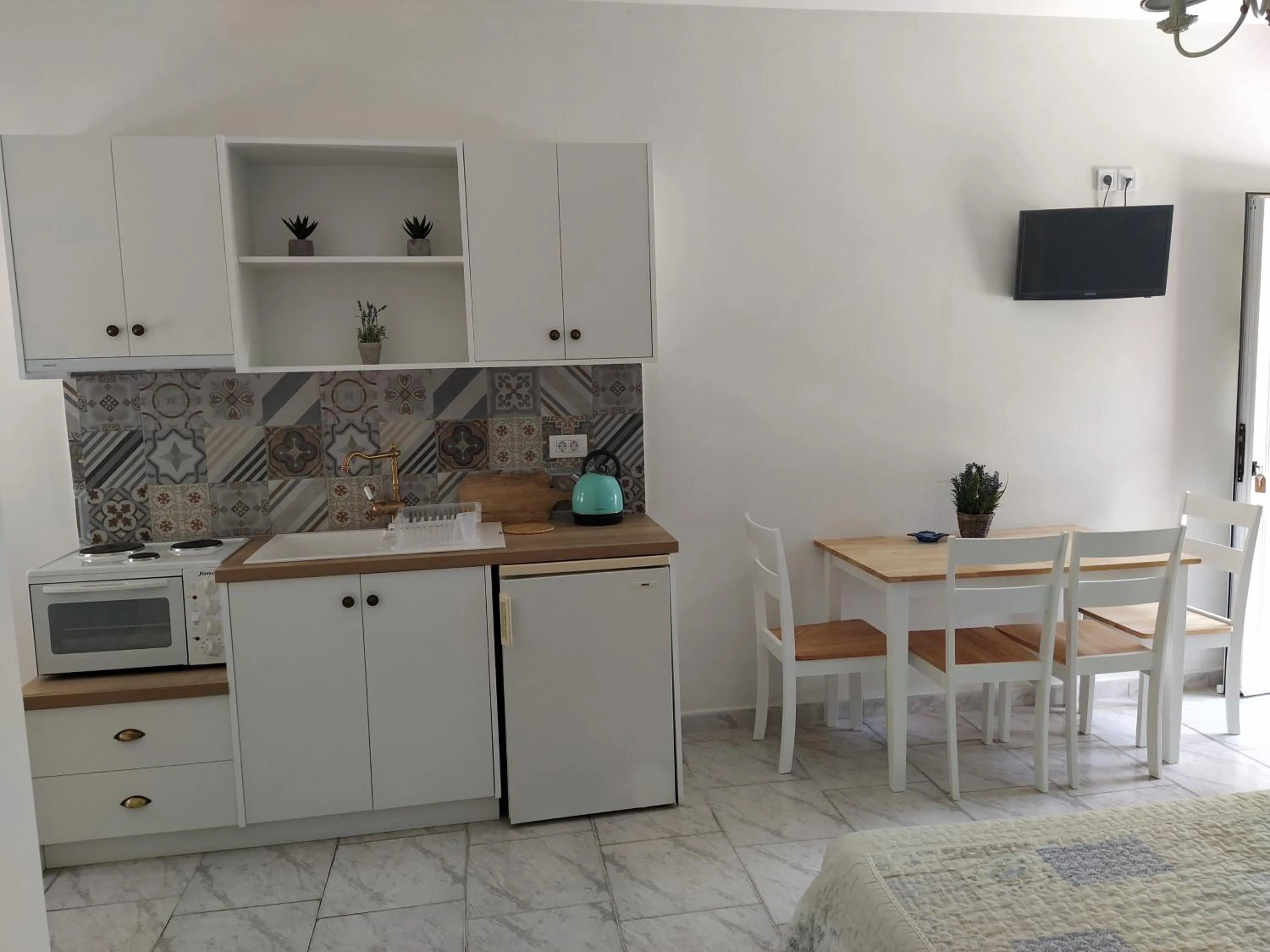 Kitchen or kitchenette in Christos Studios