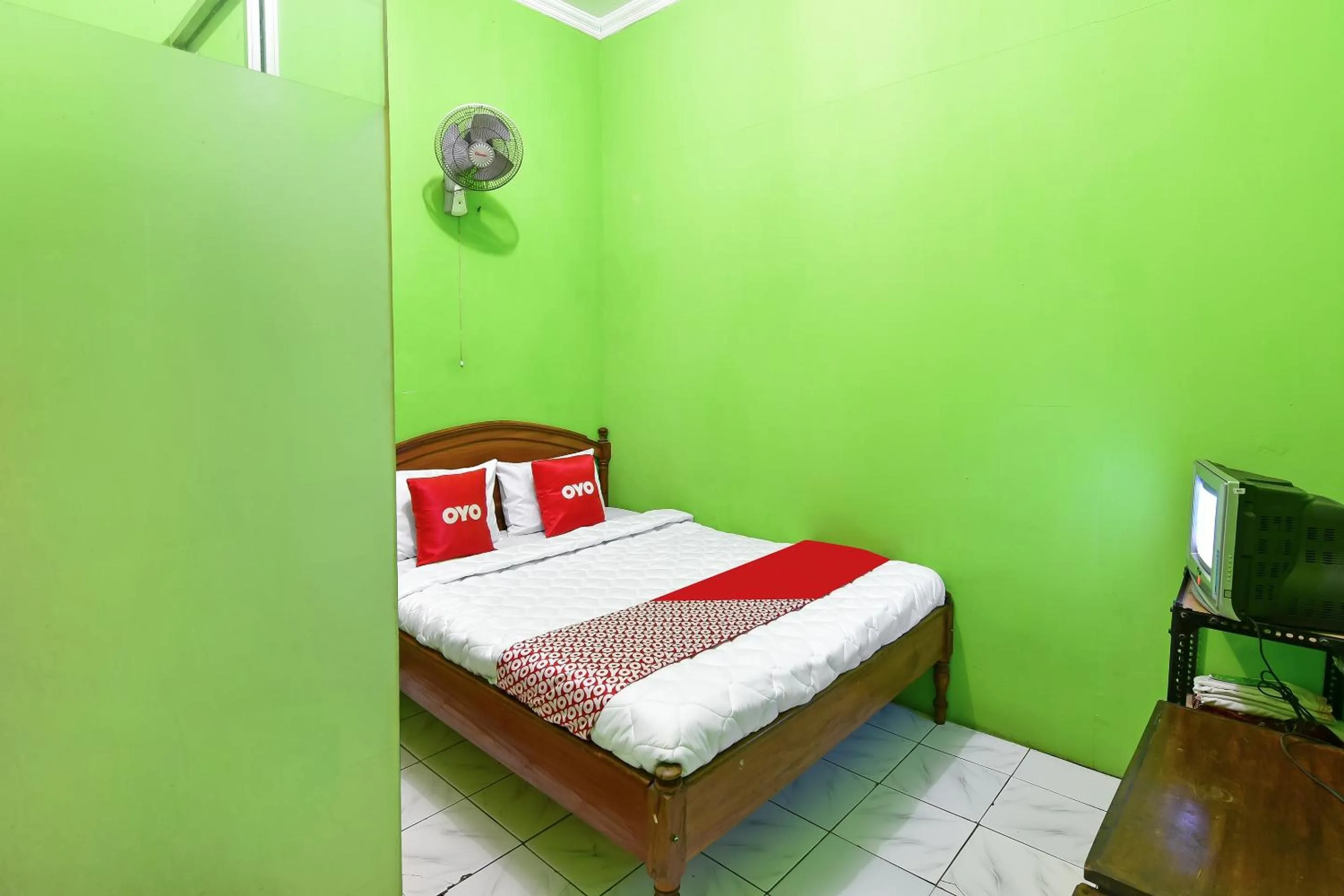 Bedroom, Bed in SPOT ON 91357 Hotel Mulyo