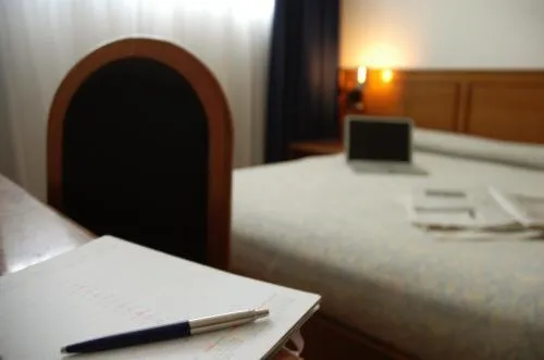 Bed in Hotel Cavallino