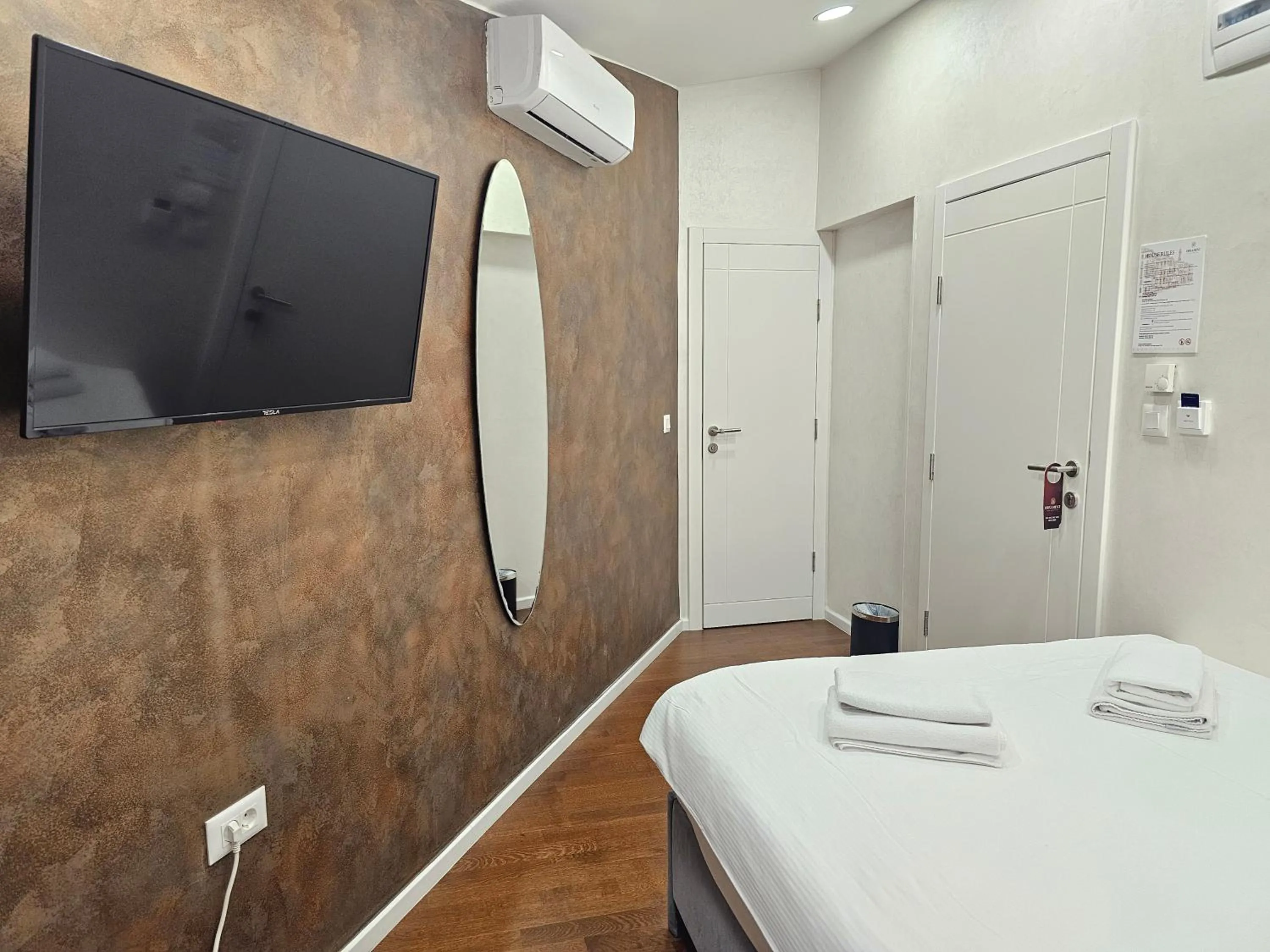 Bed in Ornament Hotel and Apartments