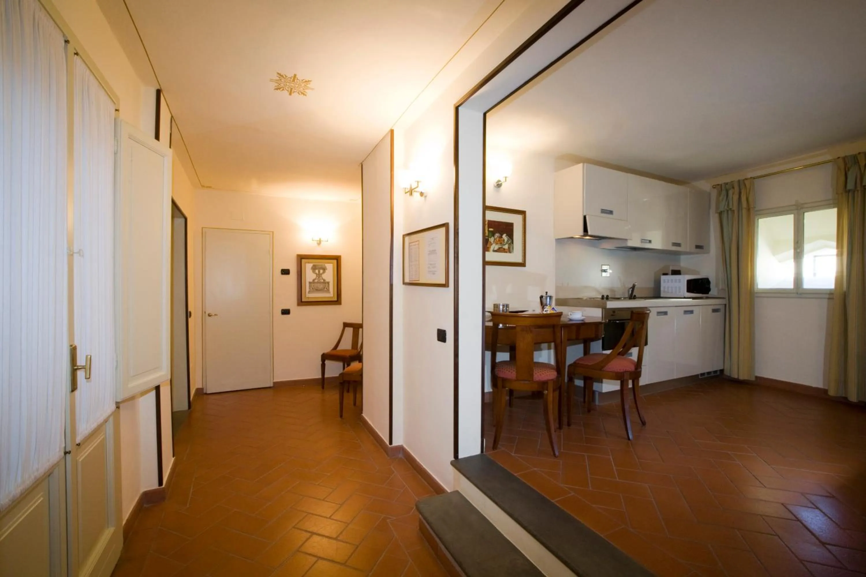 Kitchen or kitchenette in Palazzo Gamba Apartments al Duomo