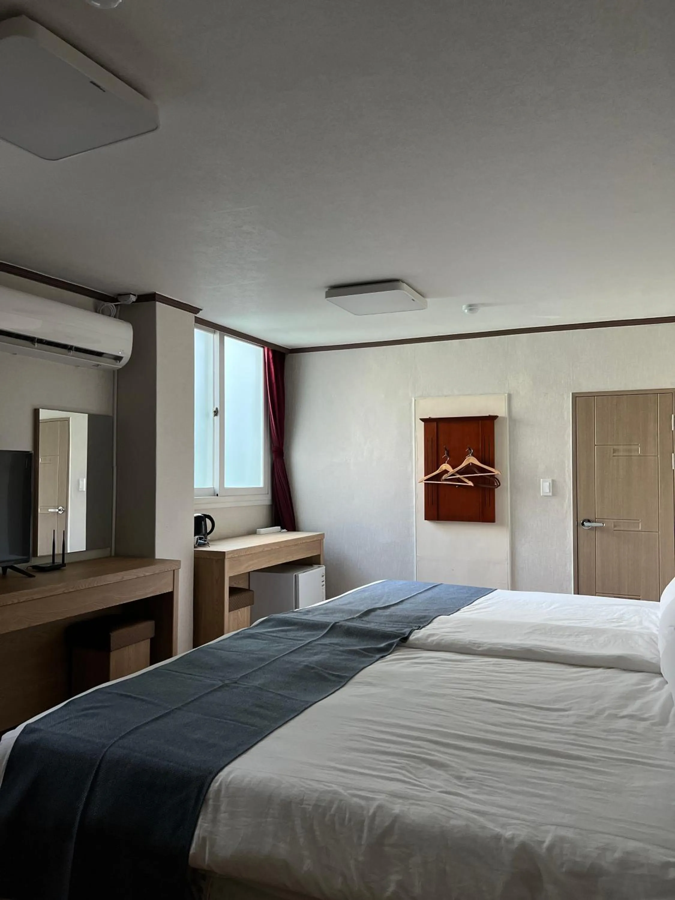 Bed in Bricks Stay Jeju City & Aiport