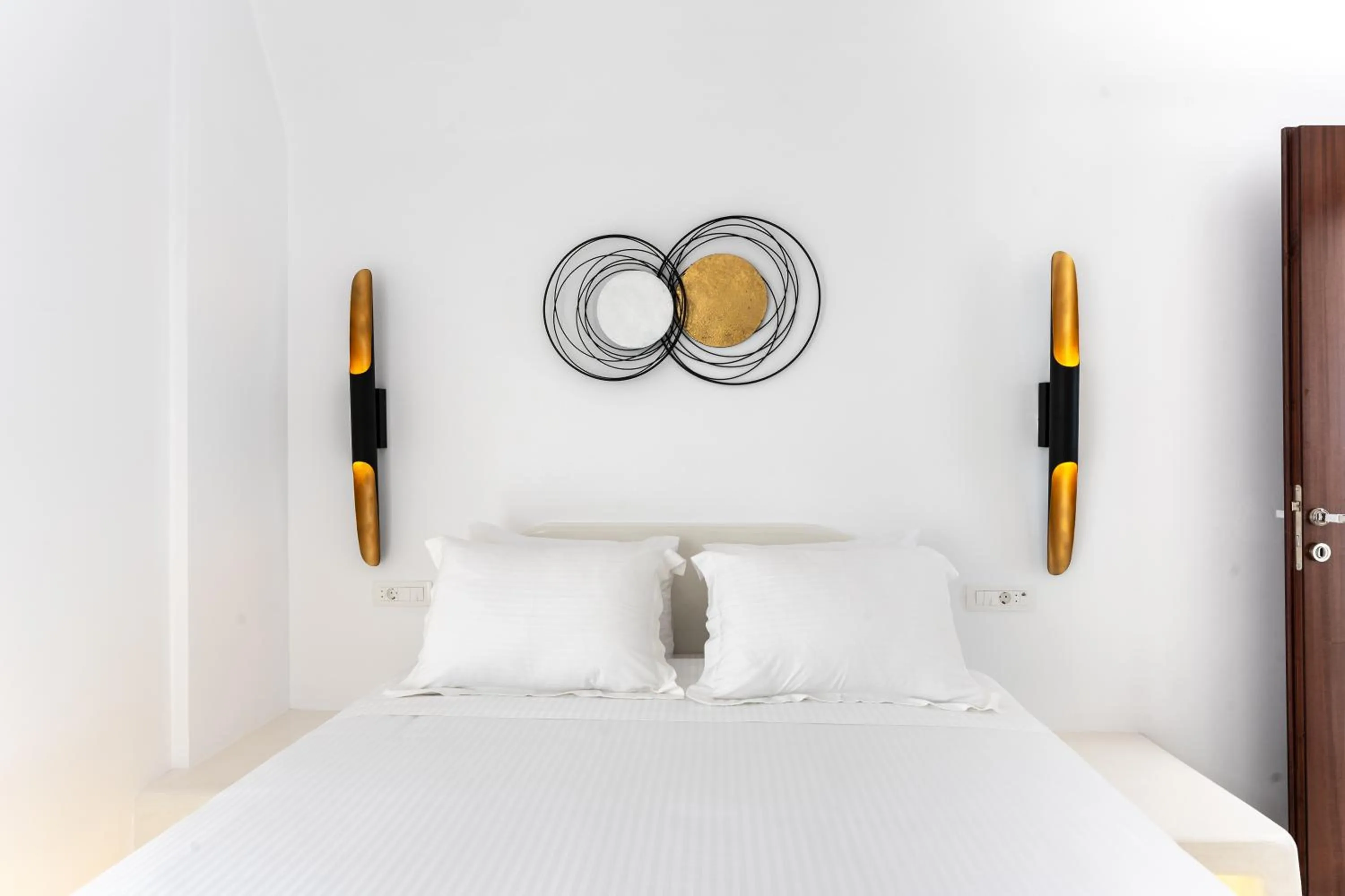 Bed in Leon Luxury Suites