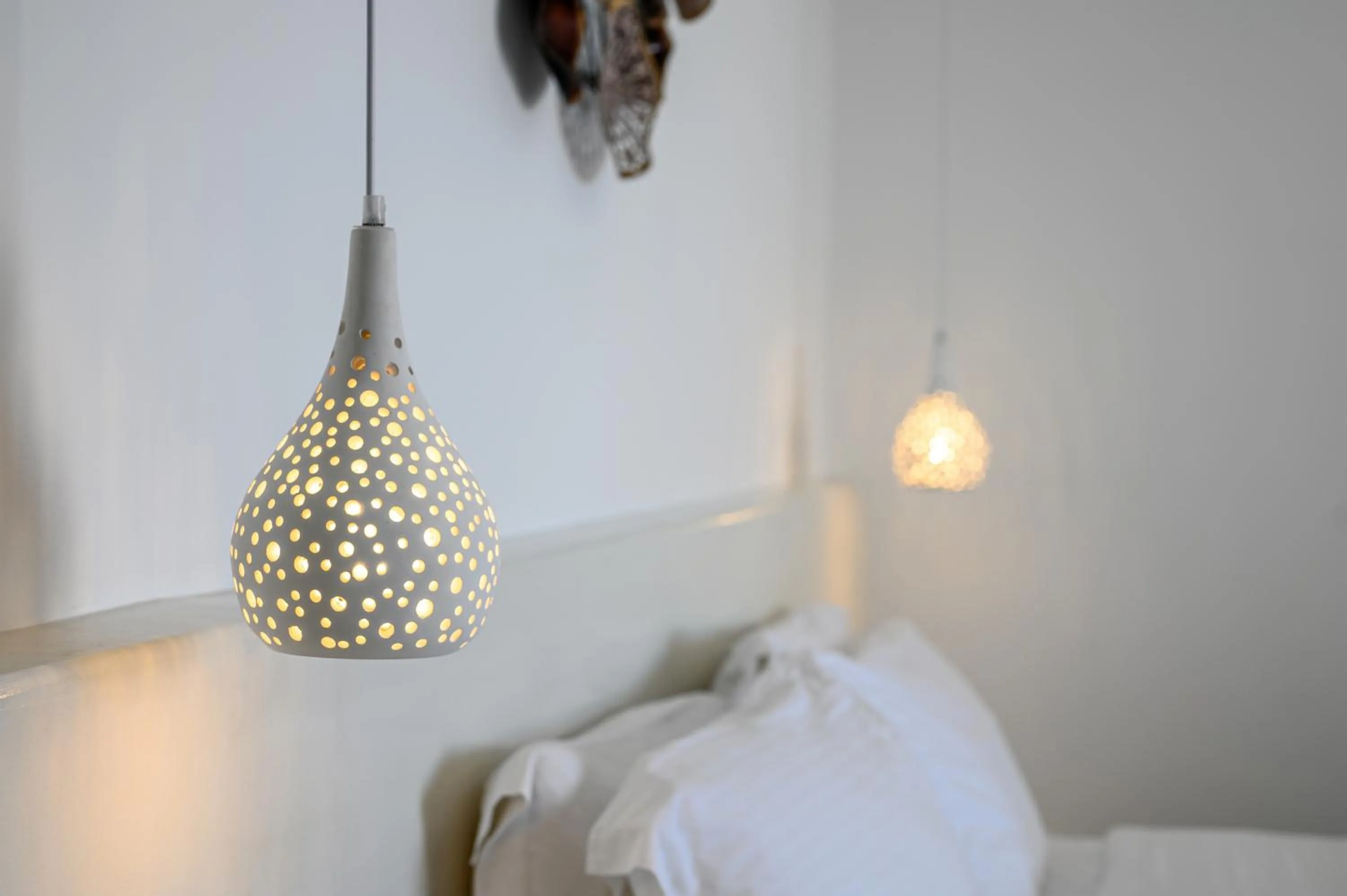 Bed in Leon Luxury Suites