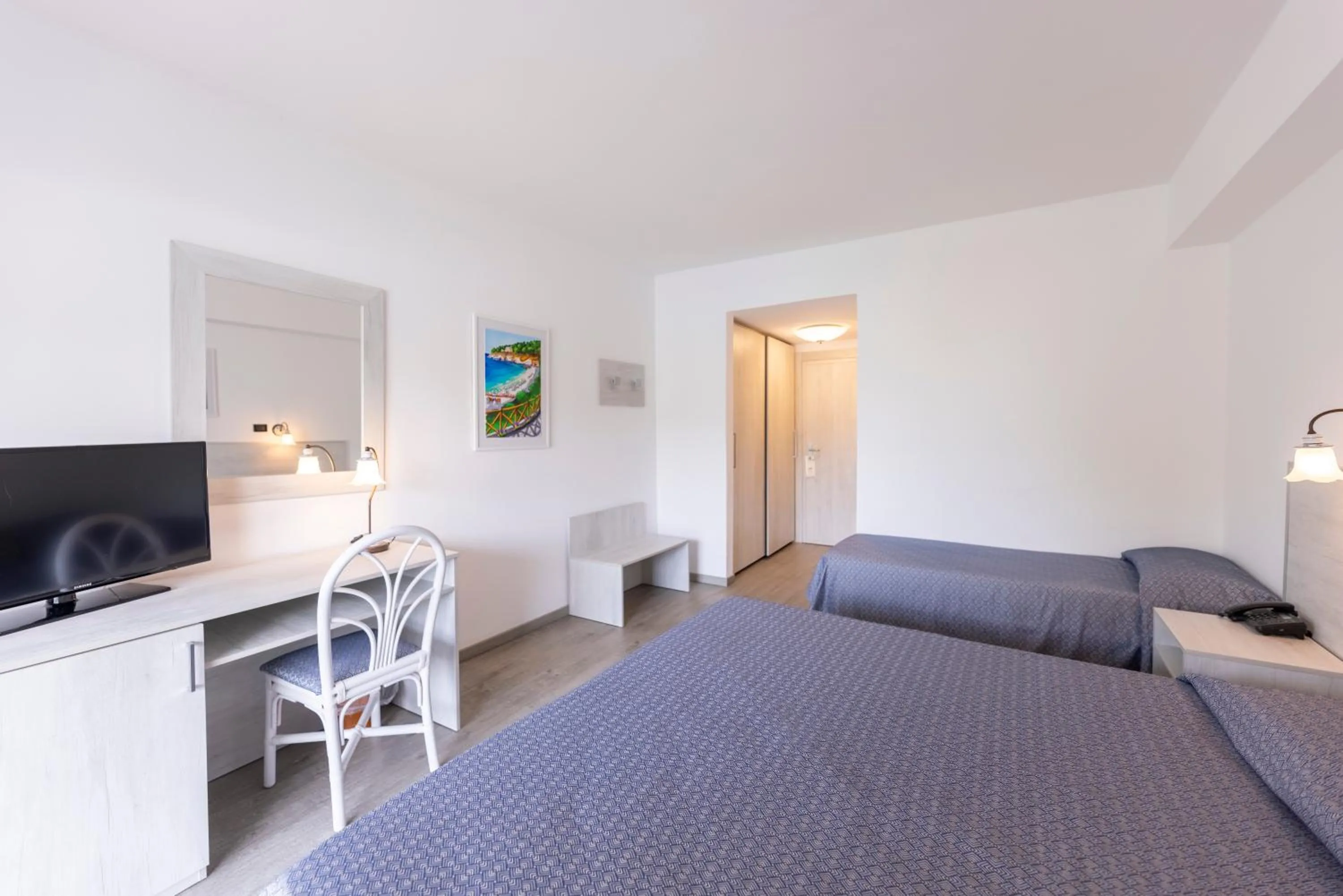 Bedroom in Pugnochiuso Resort Hotel del Faro